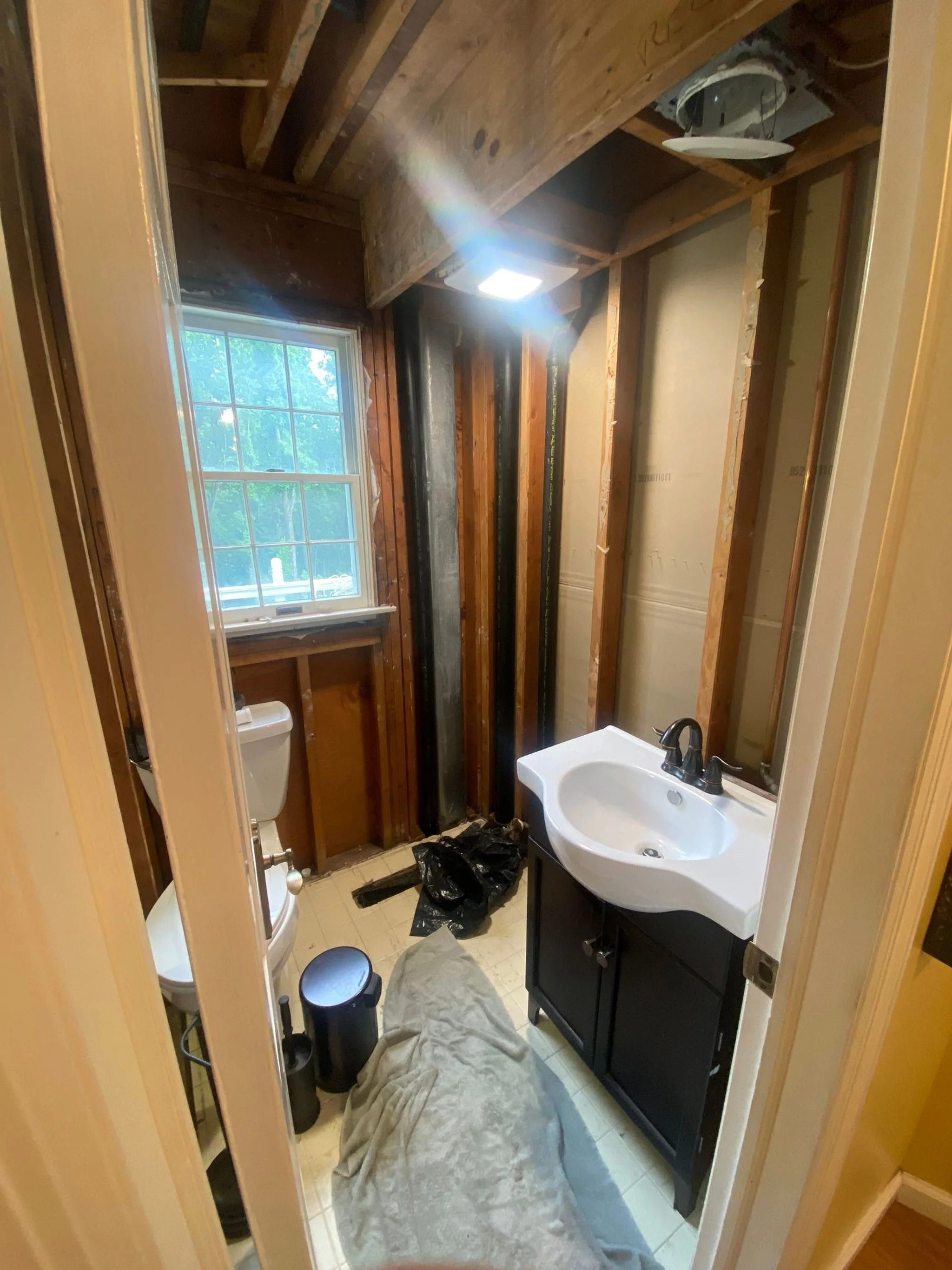 Half Bathroom Remodel — Bare Hands Construction LLC