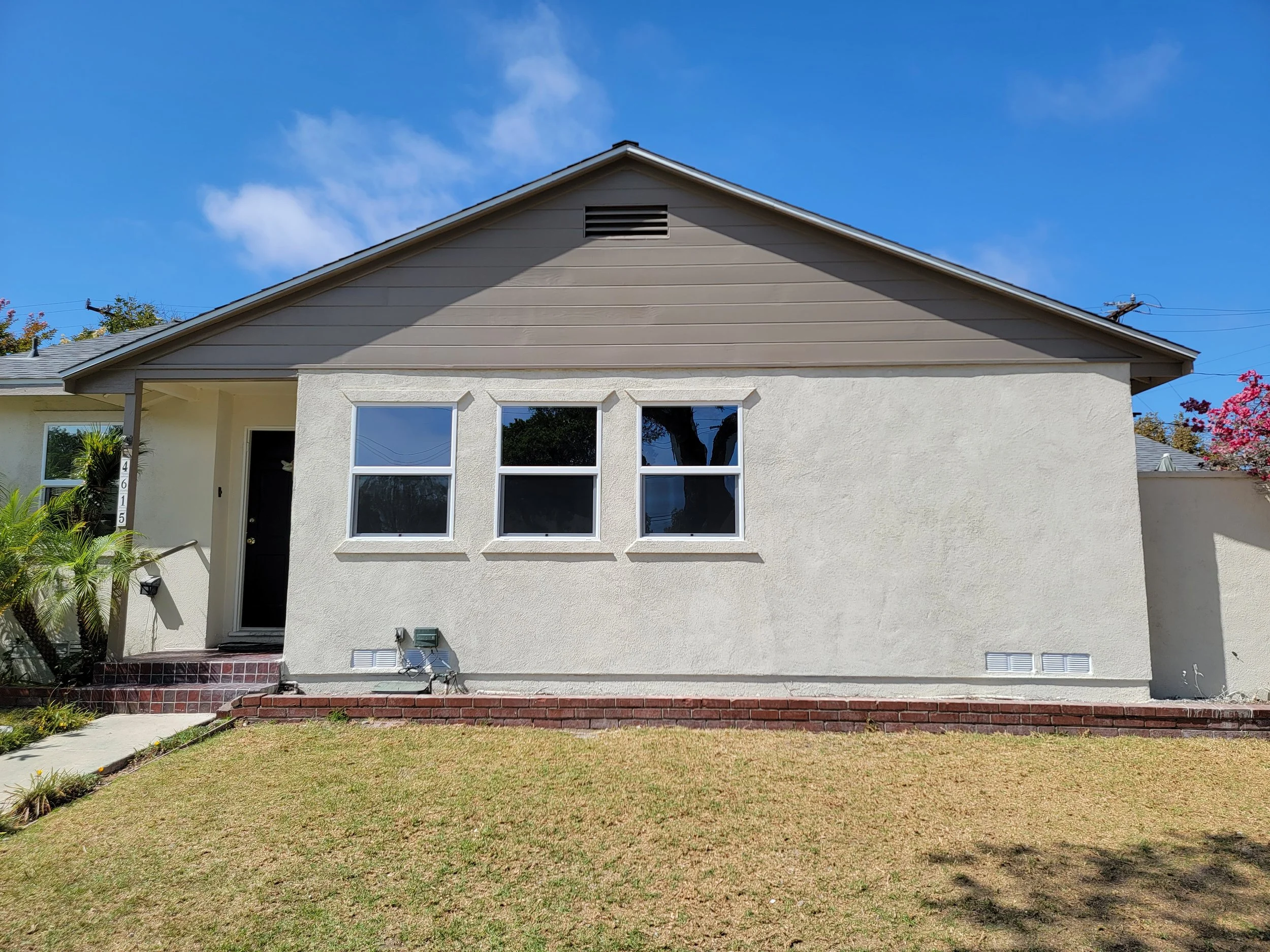 Exterior painting on the wood siding and stucco in Torrance
