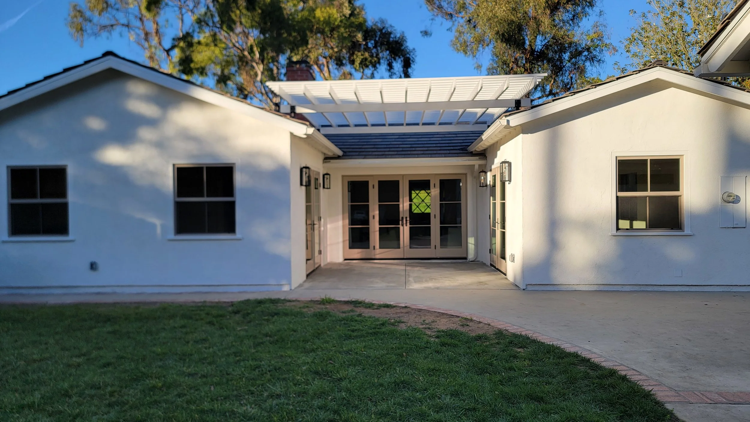 Extensions for the Master Bedroom and Dining Room with a Patio Cover