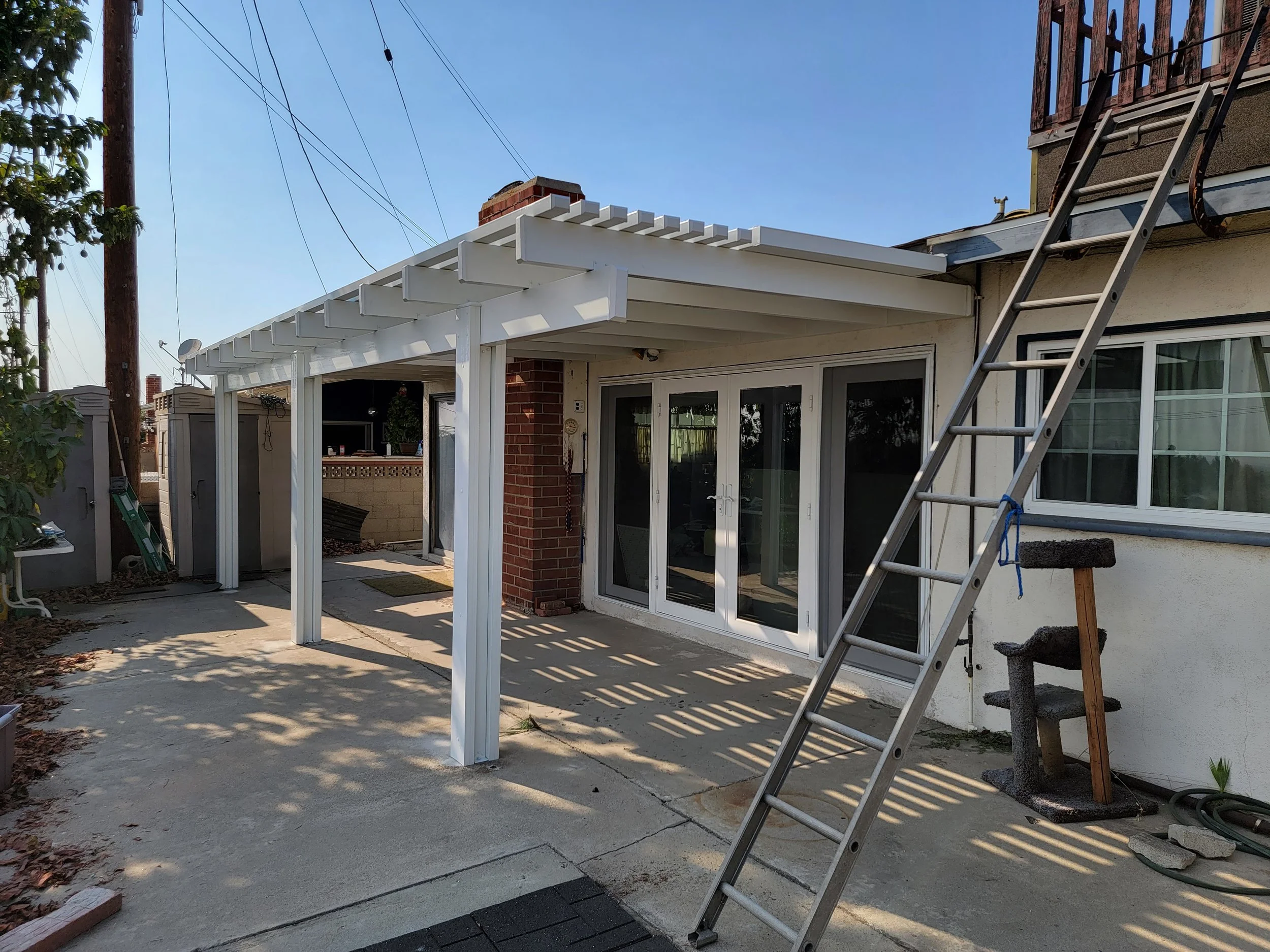 Add shade with a new solid top patio cover