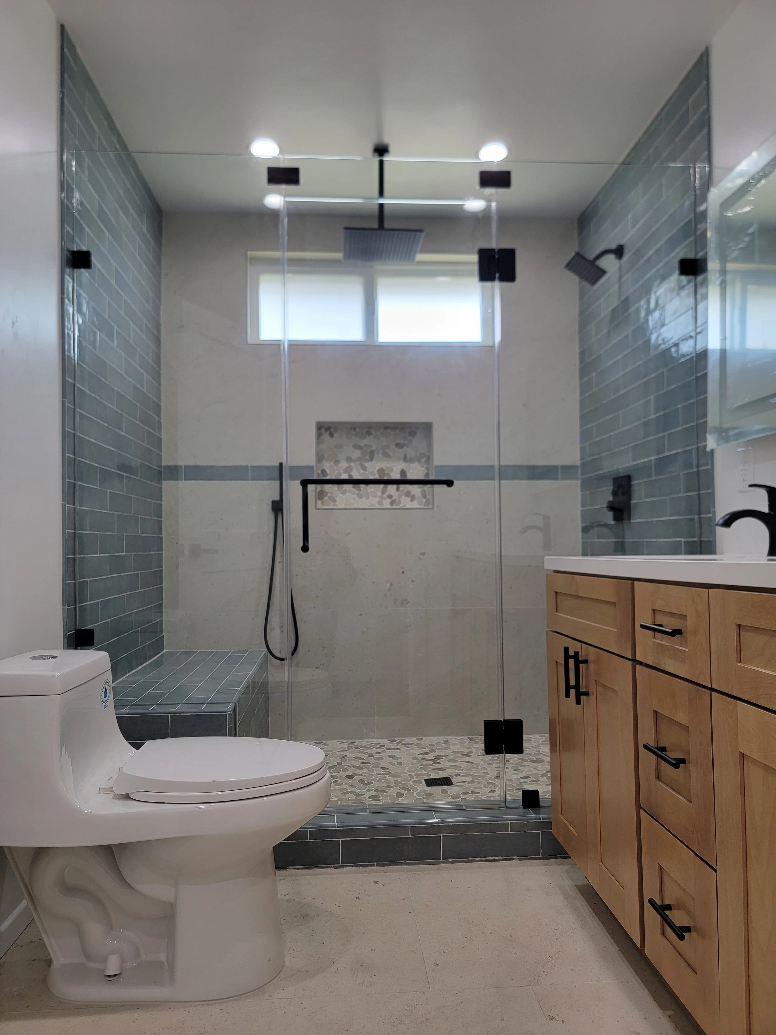 Frameless shower door was installed for the new bathroom