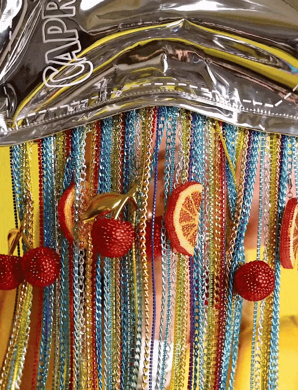 capriyellowchains-ezgif.com-optimize.gif