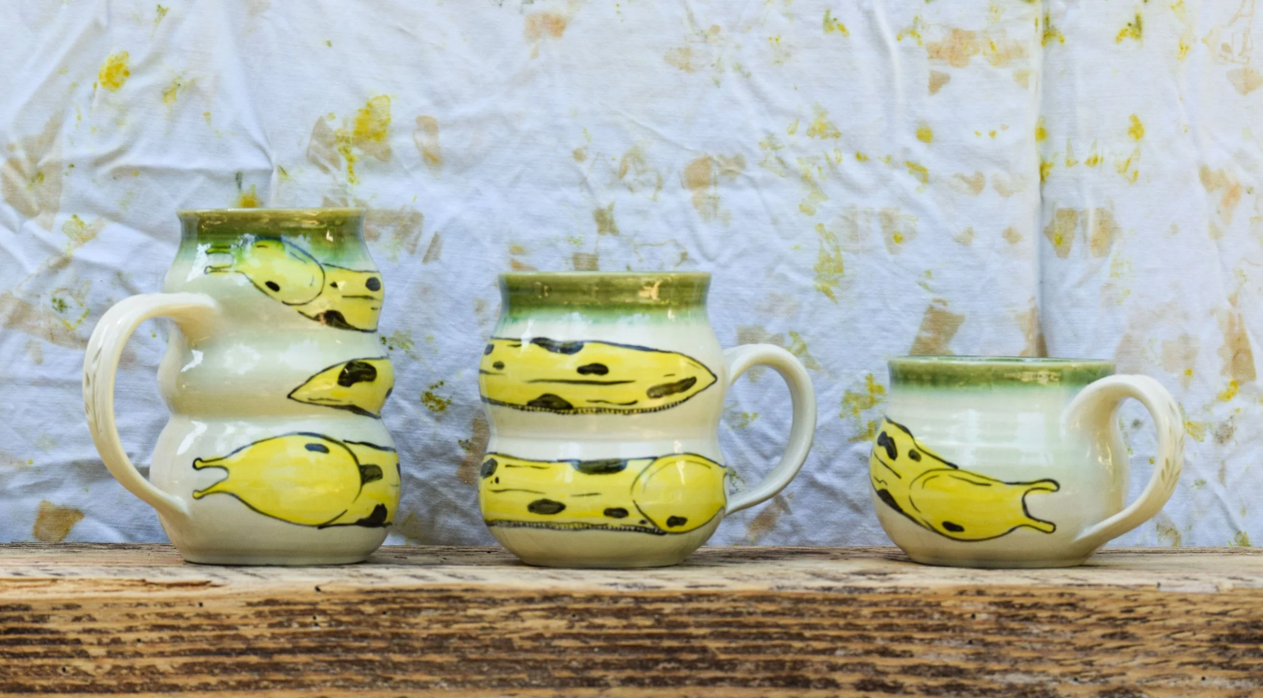 3 Size Banana Slug mugs.jpg