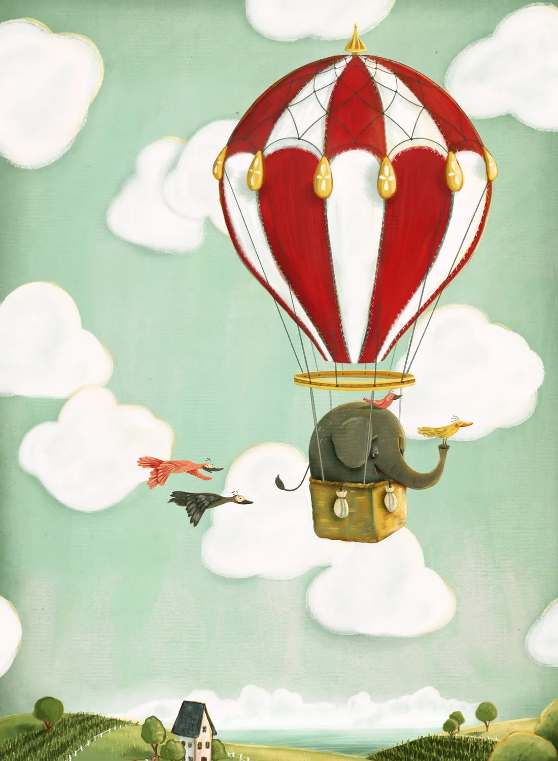 A whimsical illustration of an elephant in a hot air balloon. The balloon features red and white stripes, and the elephant is sitting in the basket with birds flying around. The background depicts a blue sky with fluffy white clouds and a distant landscape including a house and trees.
