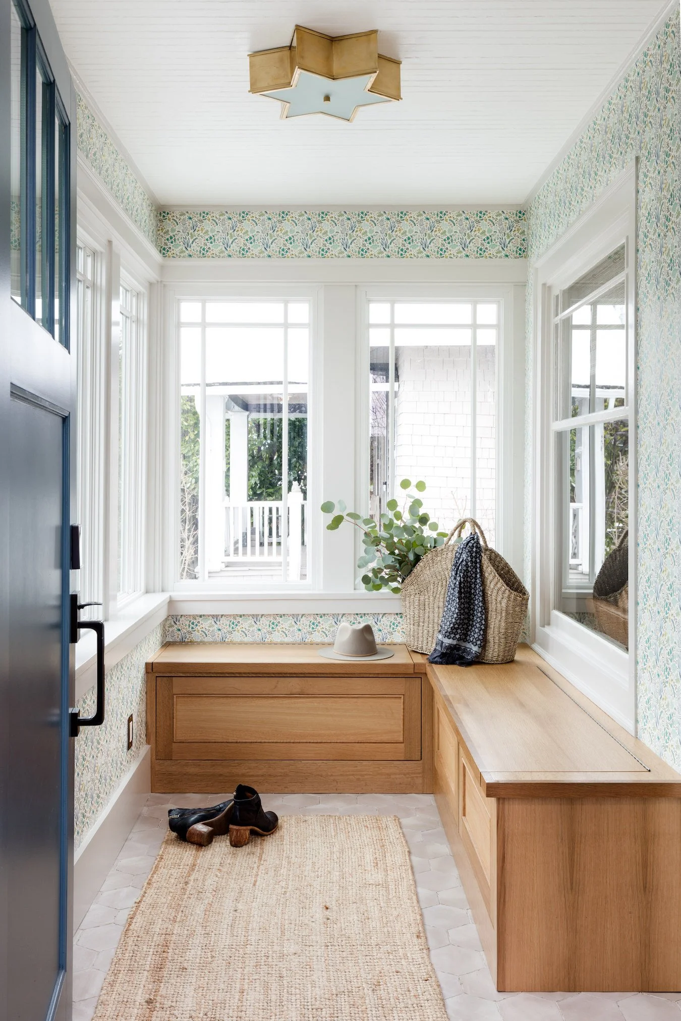 Cheerful Wallpaper and Secret Storage Make for a Smile-Inducing Entryway