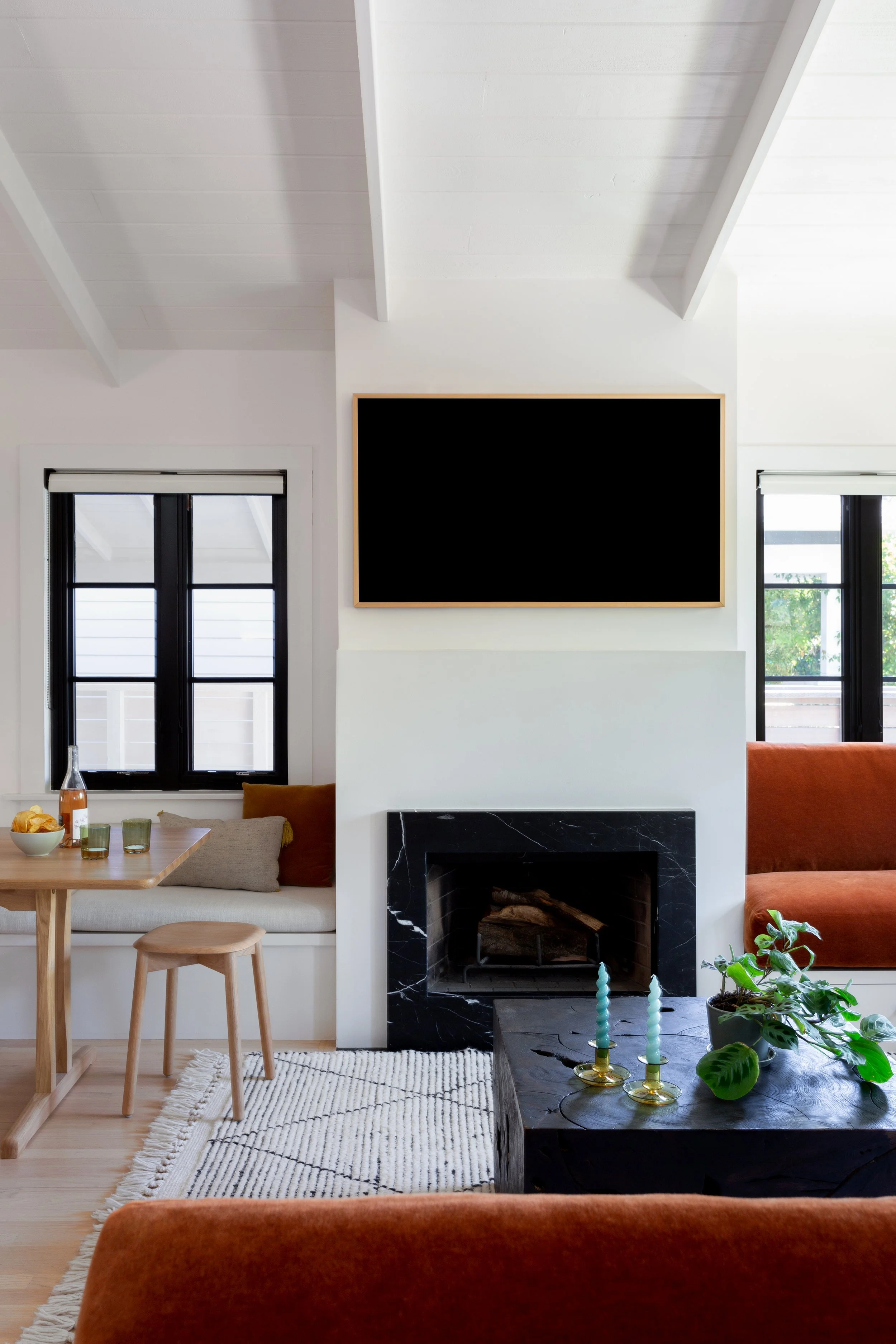 A Living Room Feels More Spacious Thanks to a Clever Use of Built-Ins