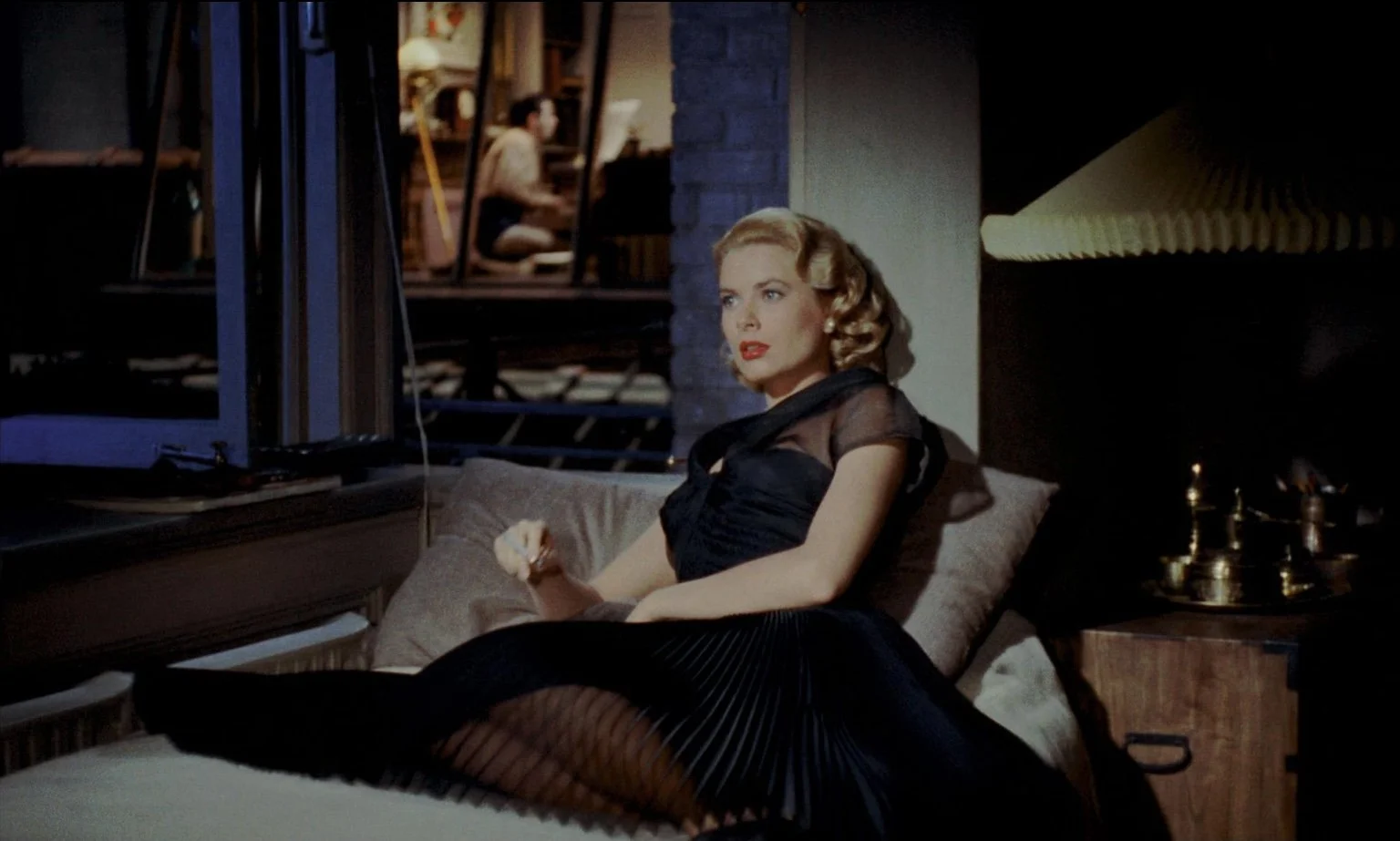 Grace Kelly in a black dress.