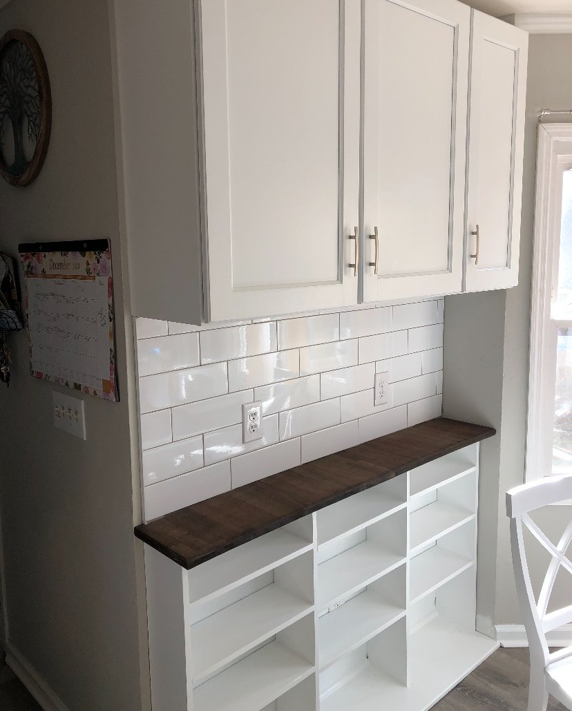 Custom shelving with butcher block and backsplash
