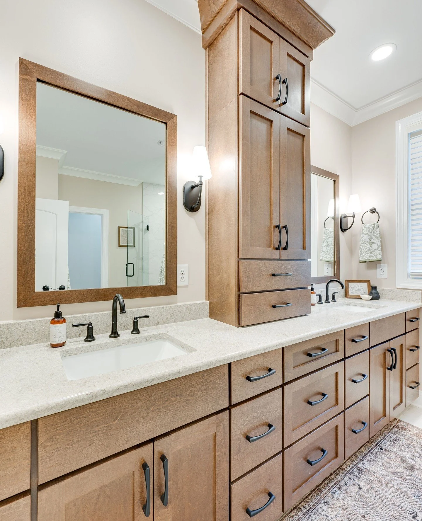 ✨ Let&rsquo;s talk bathroom storage.⁠
⁠
When renovating, don&rsquo;t just think about finishes, think about function. This custom vanity maximizes every inch with deep drawers, tall cabinets, and plenty of counter space. Because the right storage mak