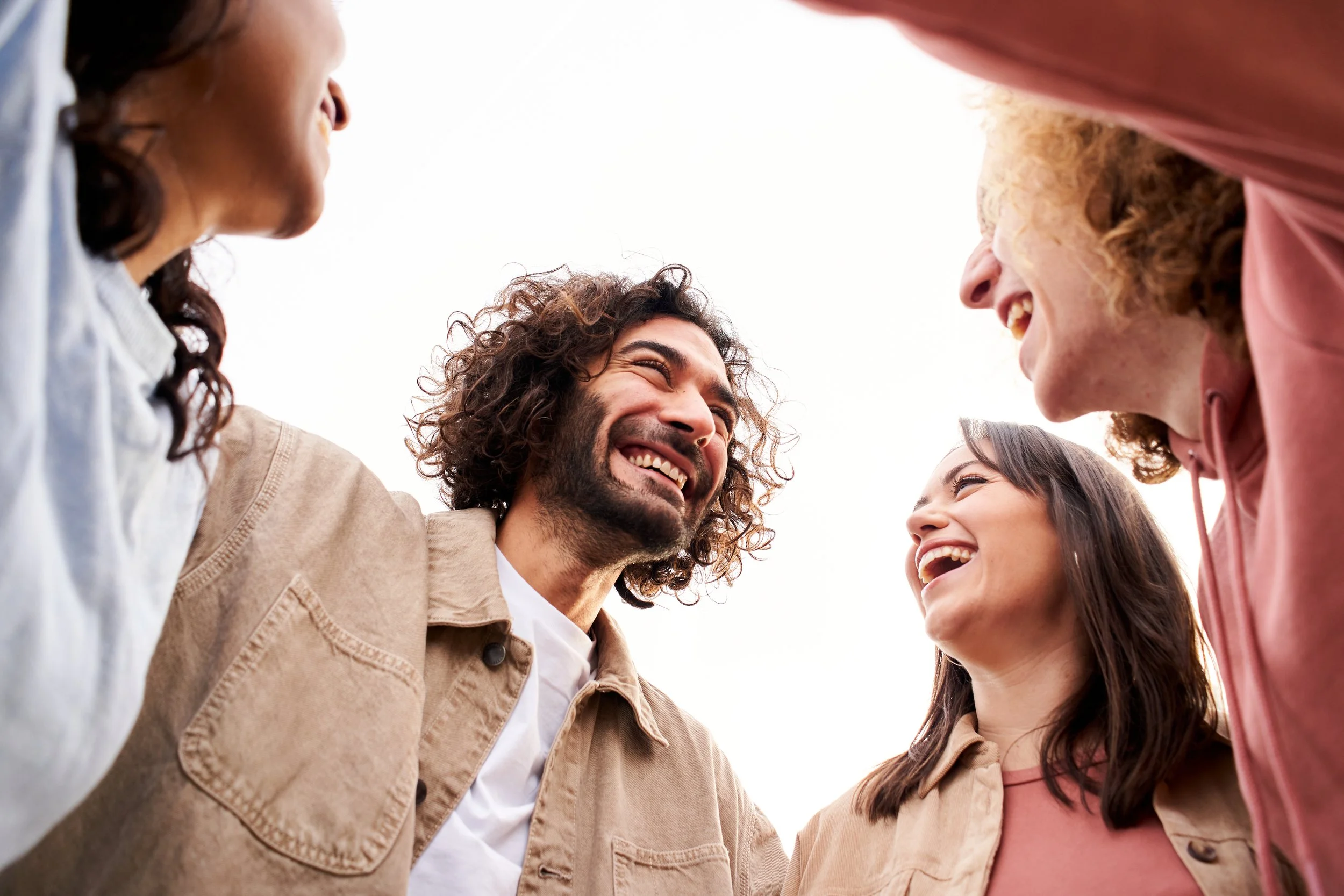 Happy people embracing each other in Davis County, Utah