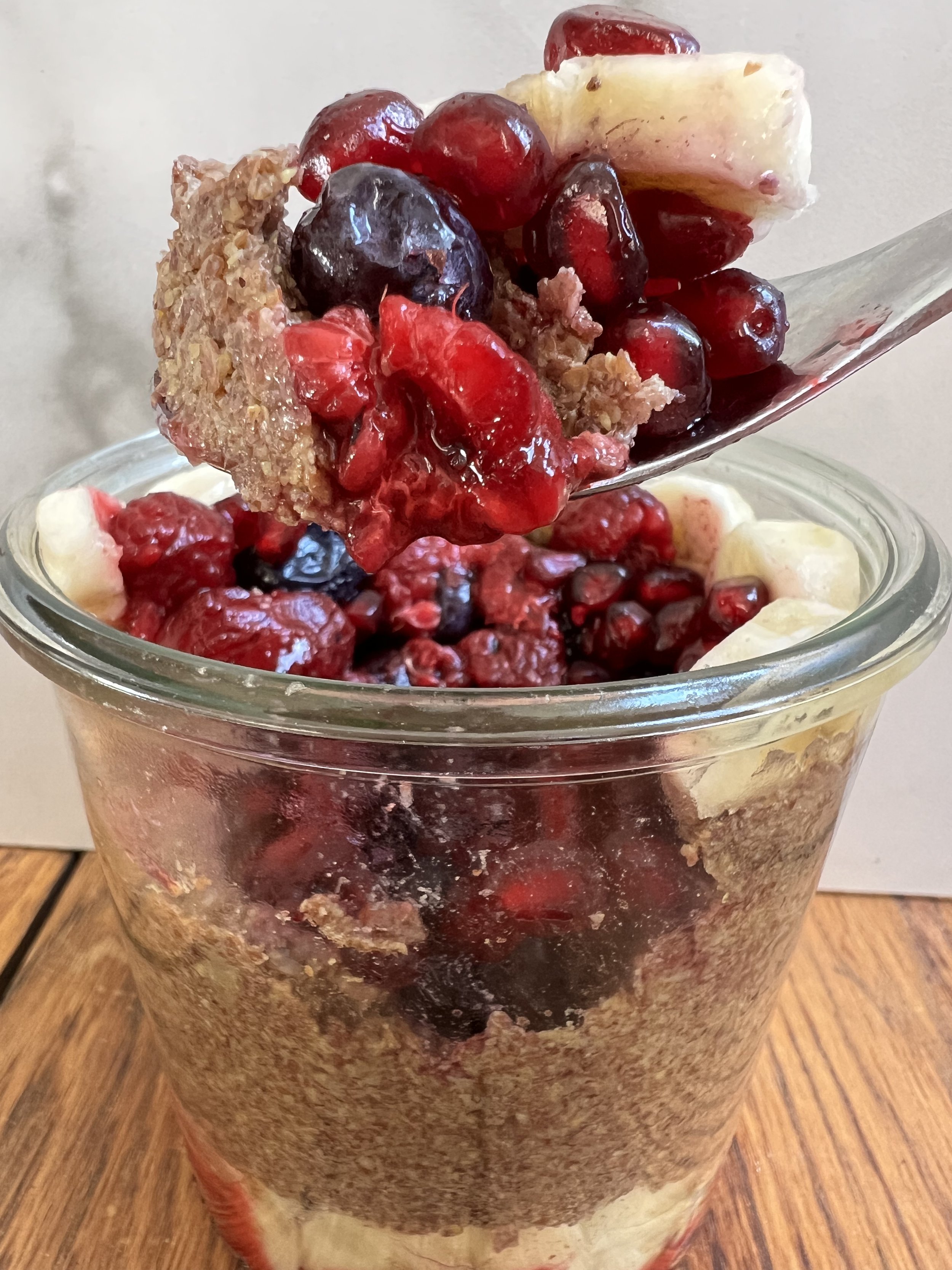 Omega-3-rich flax breakfast or dessert topped with bananas and mixed berries.