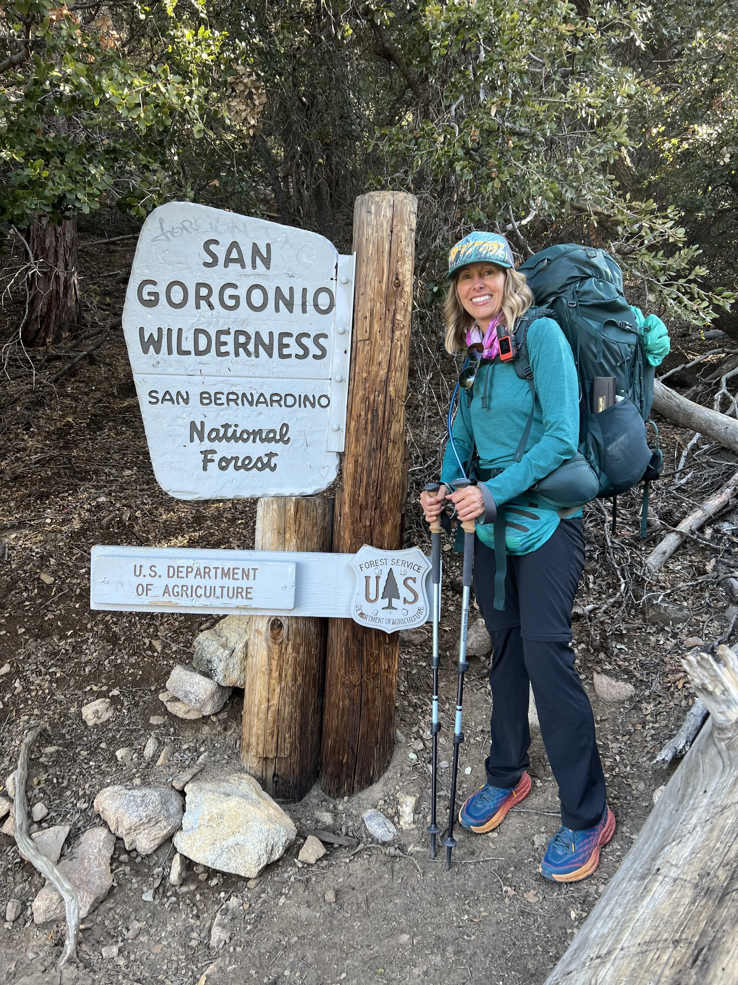 Woman backpacking in the San Gorgonio Wilderness, illustrating healthy aging, vitality, and an active lifestyle during midlife.