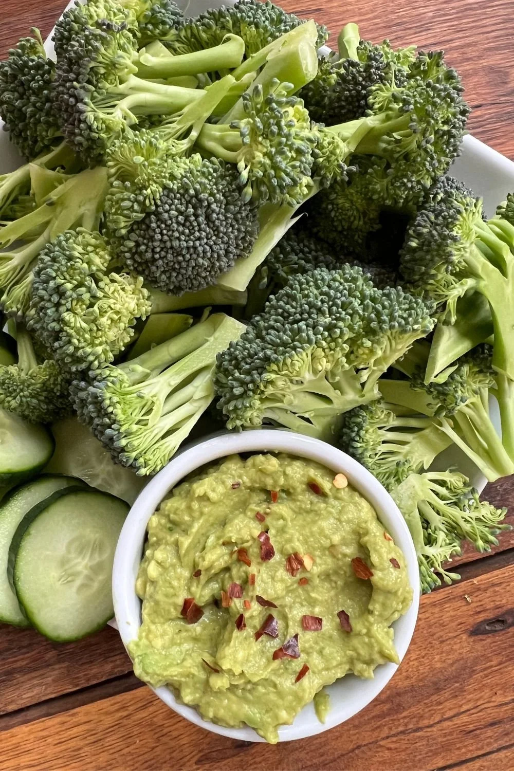 Fresh Broccoli and cucumber served with homemade guacamole.