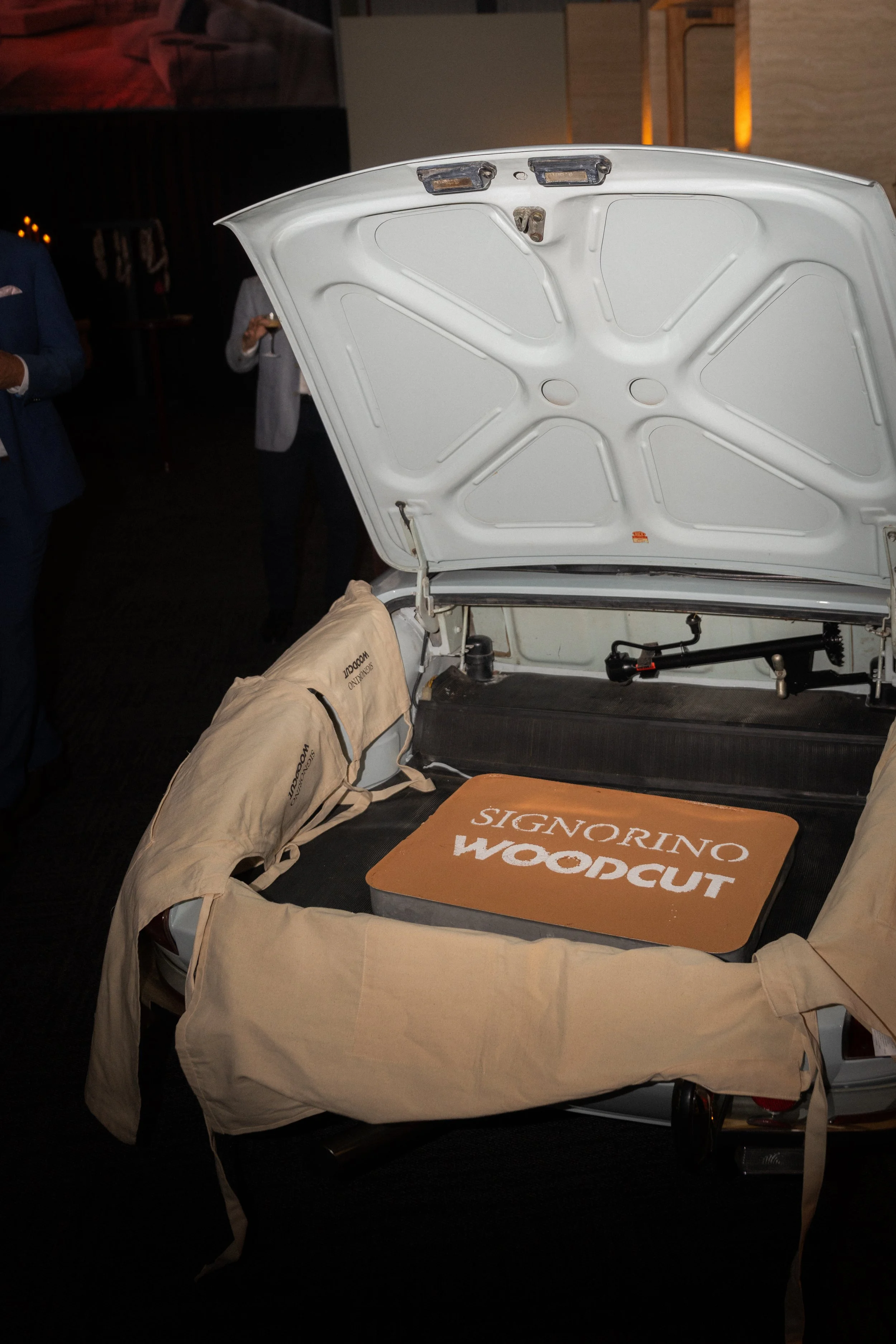 A large Italian tiramisu served out of a luxury vintage car in Brisbane, Queensland