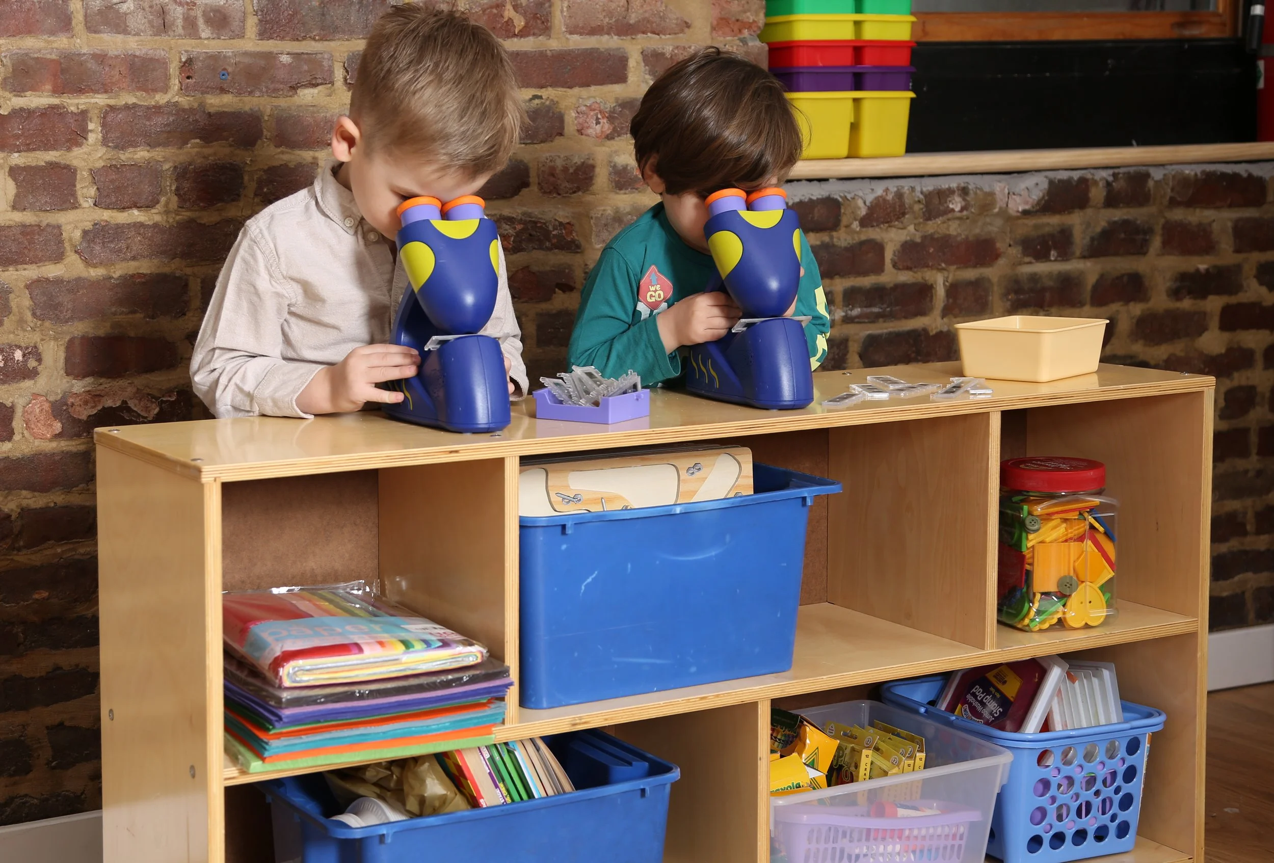 Children engaged in creative learning at Ladybug Preschool