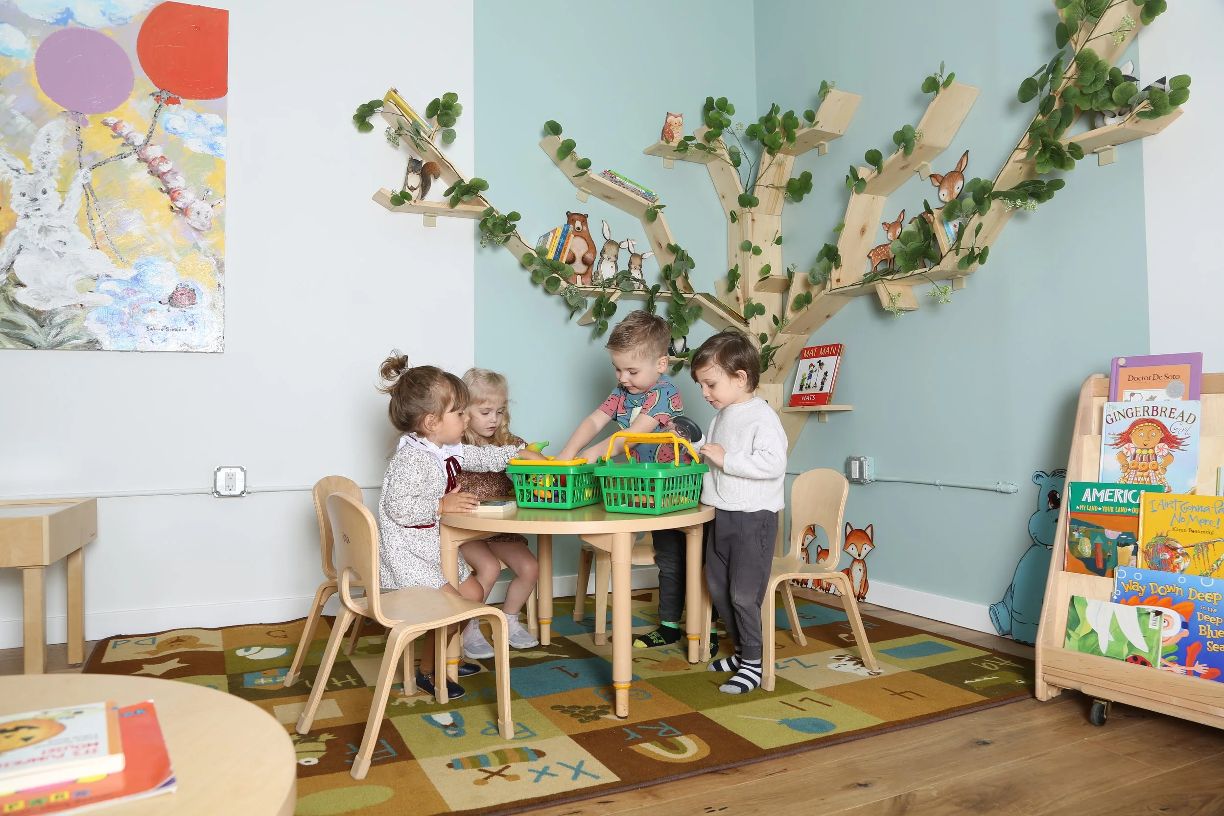 Children playing in a Ladybug Preschool classroom in Brooklyn