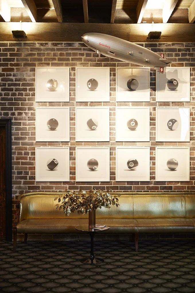 Gallery wall and zepplin mobile by Kelly Ross
