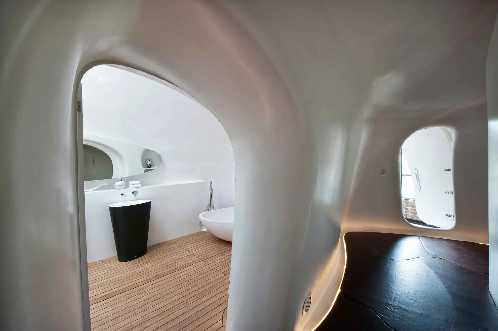 Fibreglass bathroom with organic curves in a residential warehouse in Sydney