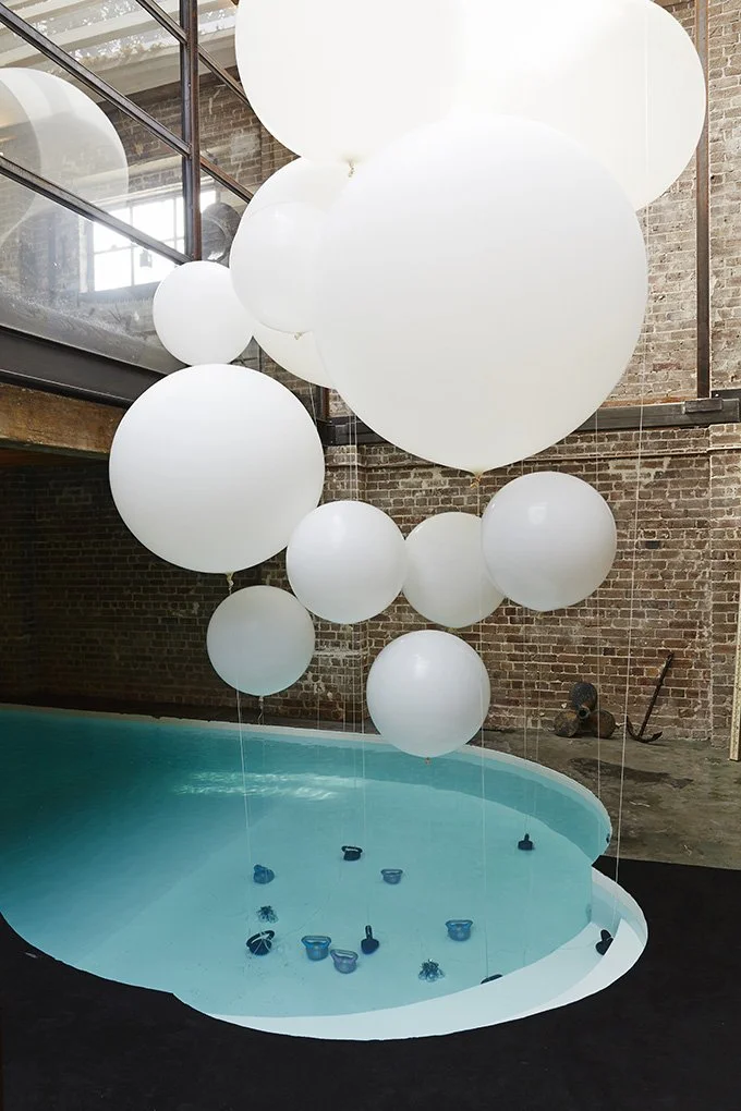 suspended pendant light installation at a residential warehouse by Kelly Ross