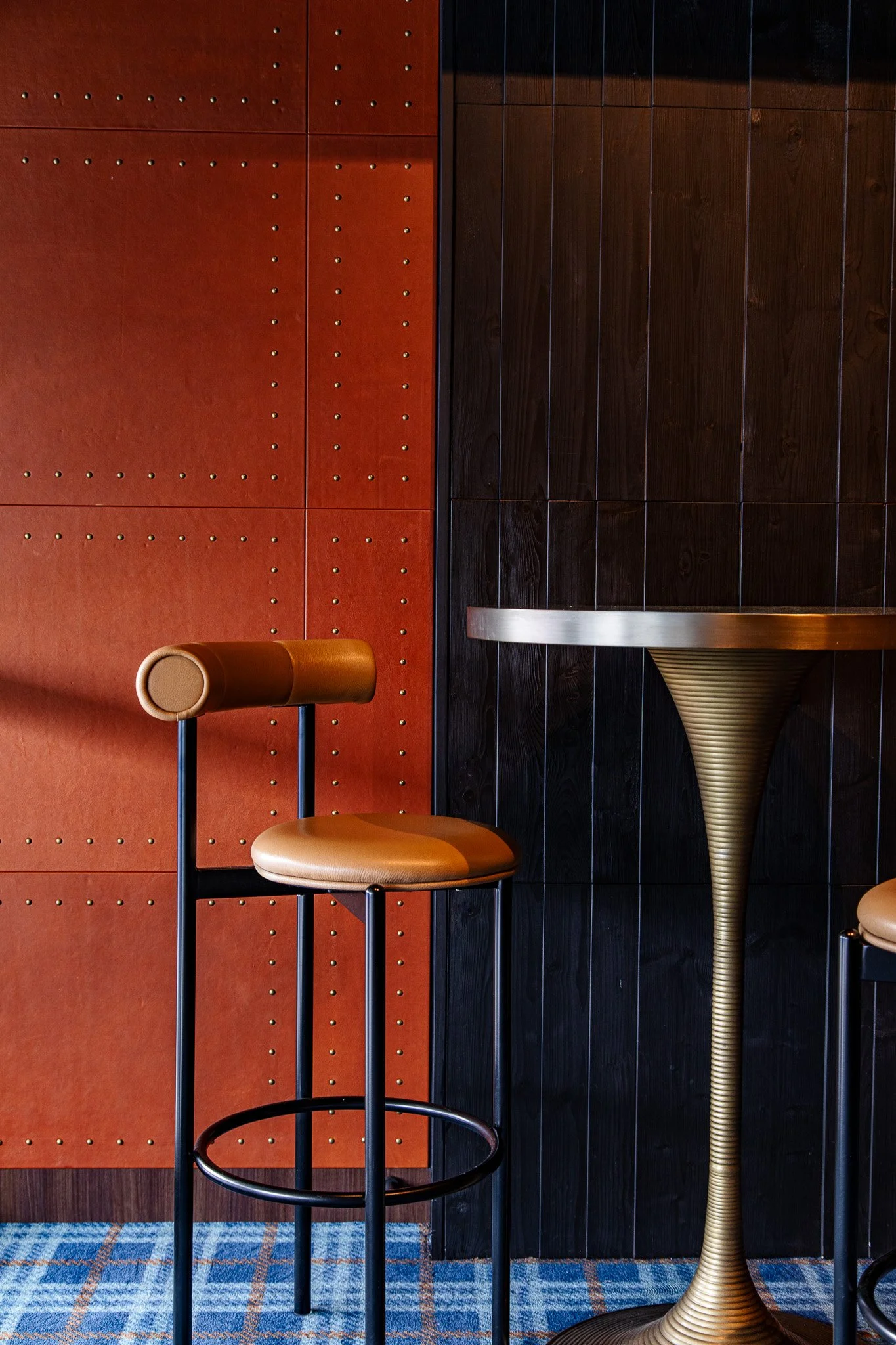 Leather bar chair and art-deco inspired bar table at Allianz Stadium private suite