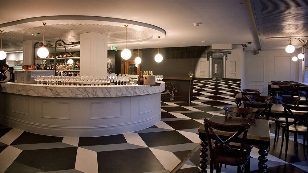 wide bar and tiled floor detail, designed by Kelly Ross