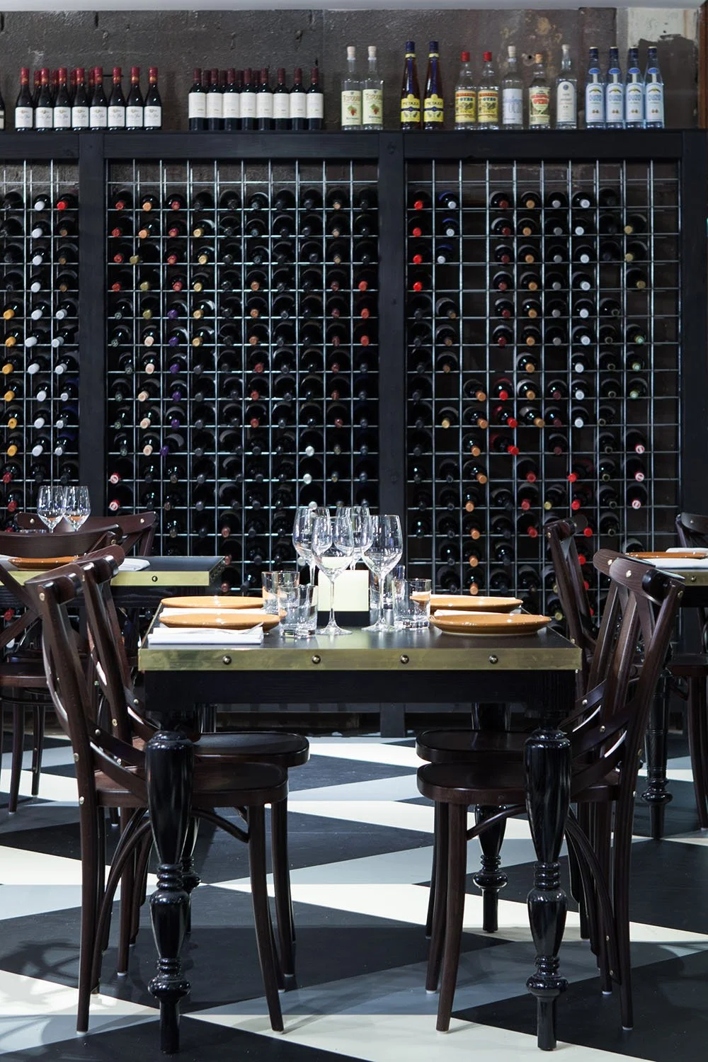 wine rack and dining tables at a greek restaurant in Bondi Junction, design by Kelly Ross
