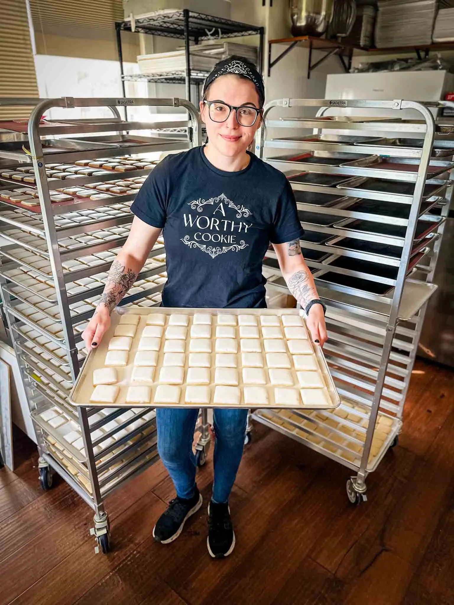 A Worthy Cookie Jay holding a tray of sugar cookies.jpg