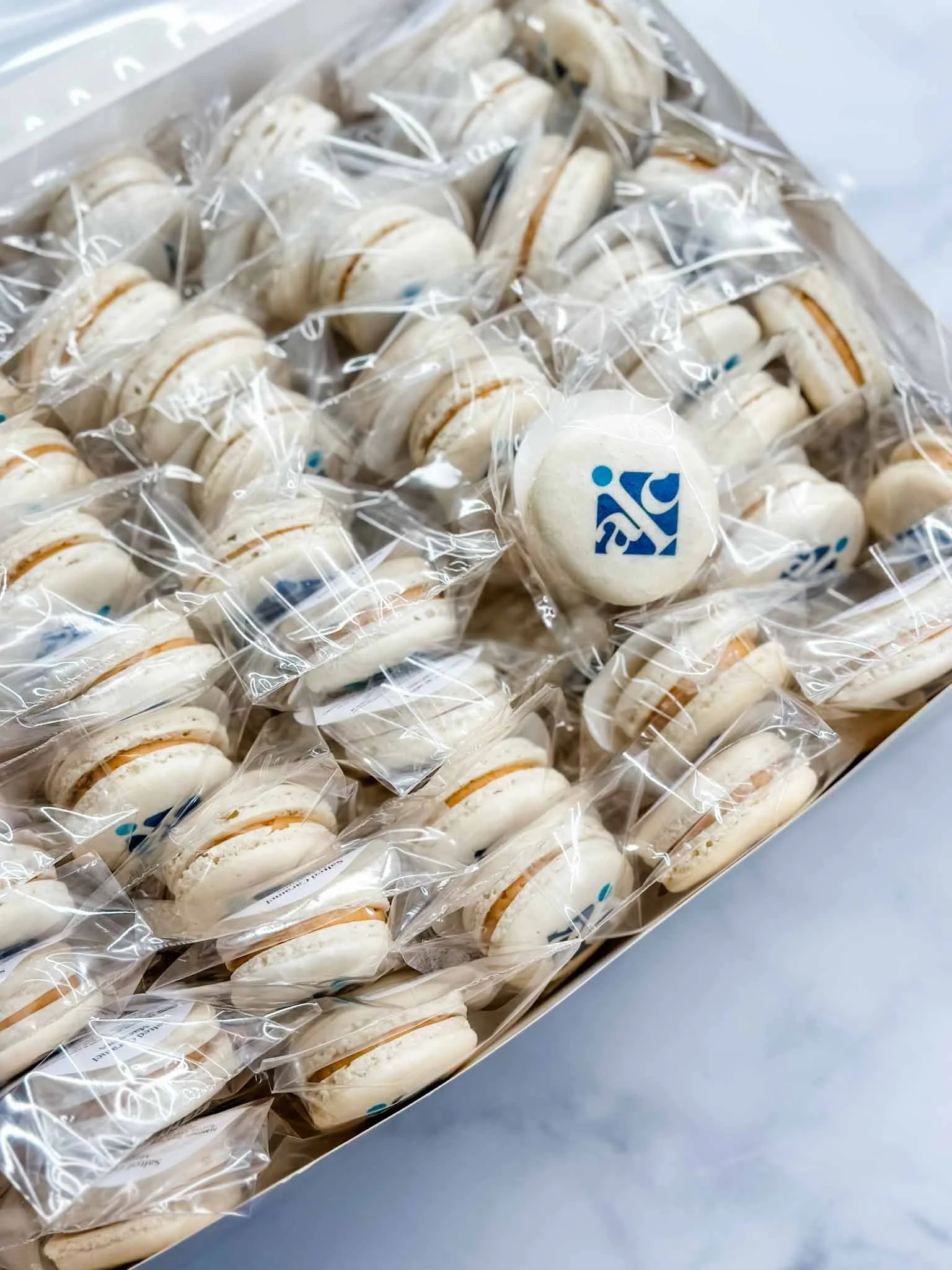 A Worthy Cookie insurance logo macarons individually bagged.jpg