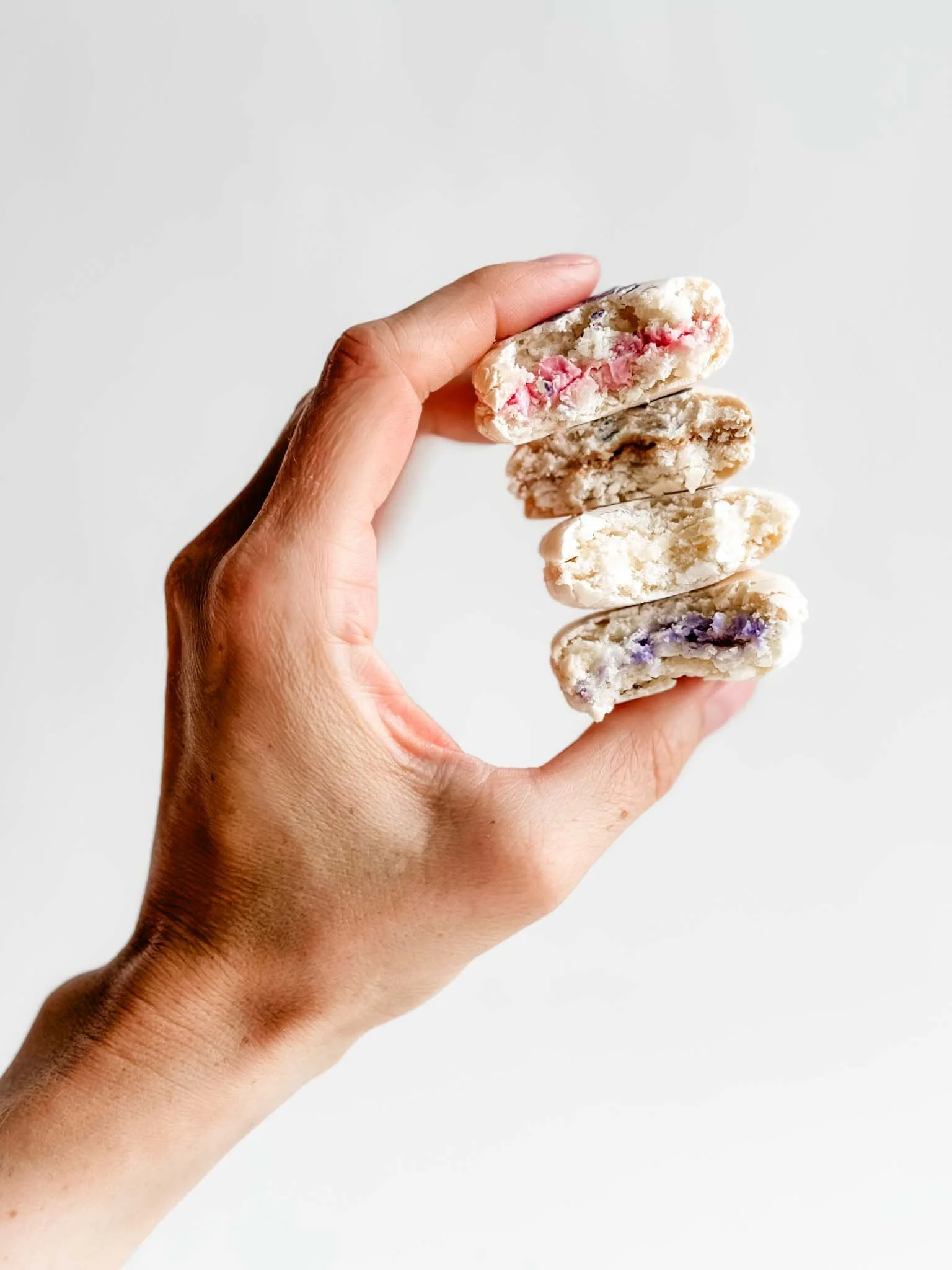 A Worthy Cookie four macarons cross section mac stack.jpg