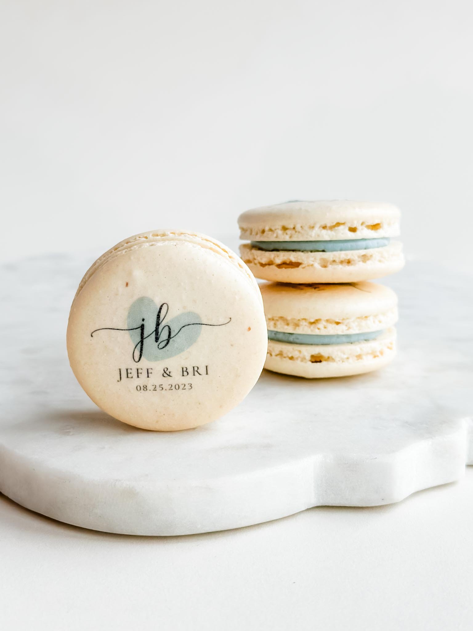 A Worthy Cookie Sugar wedding initials and date macarons.jpg
