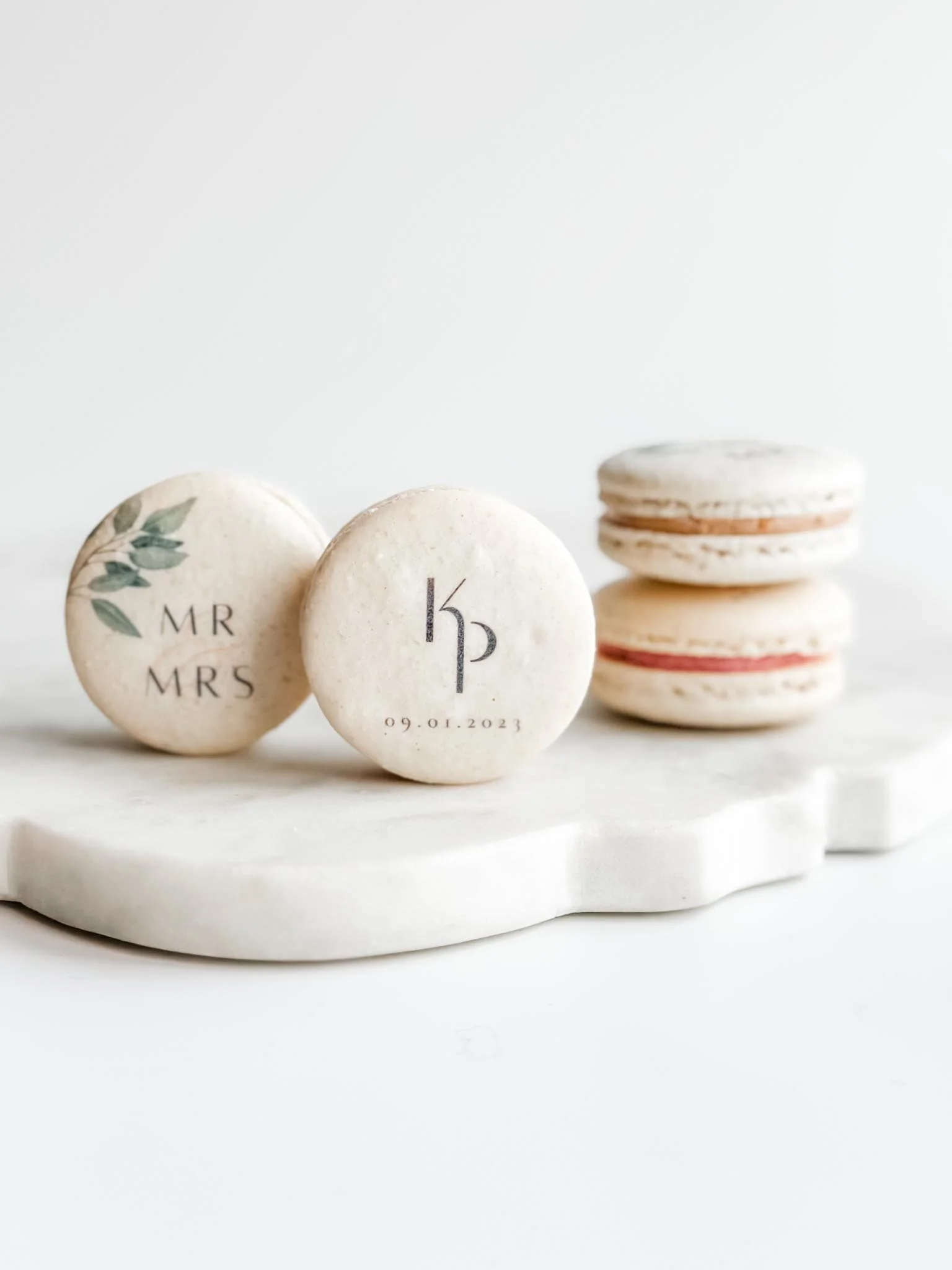 A Worthy Cookie monogram wedding macarons stack.jpg