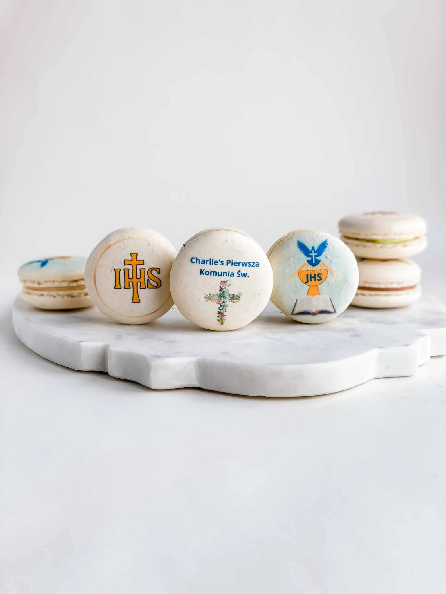 A Worthy Cookie first communion macarons in bulk.JPG