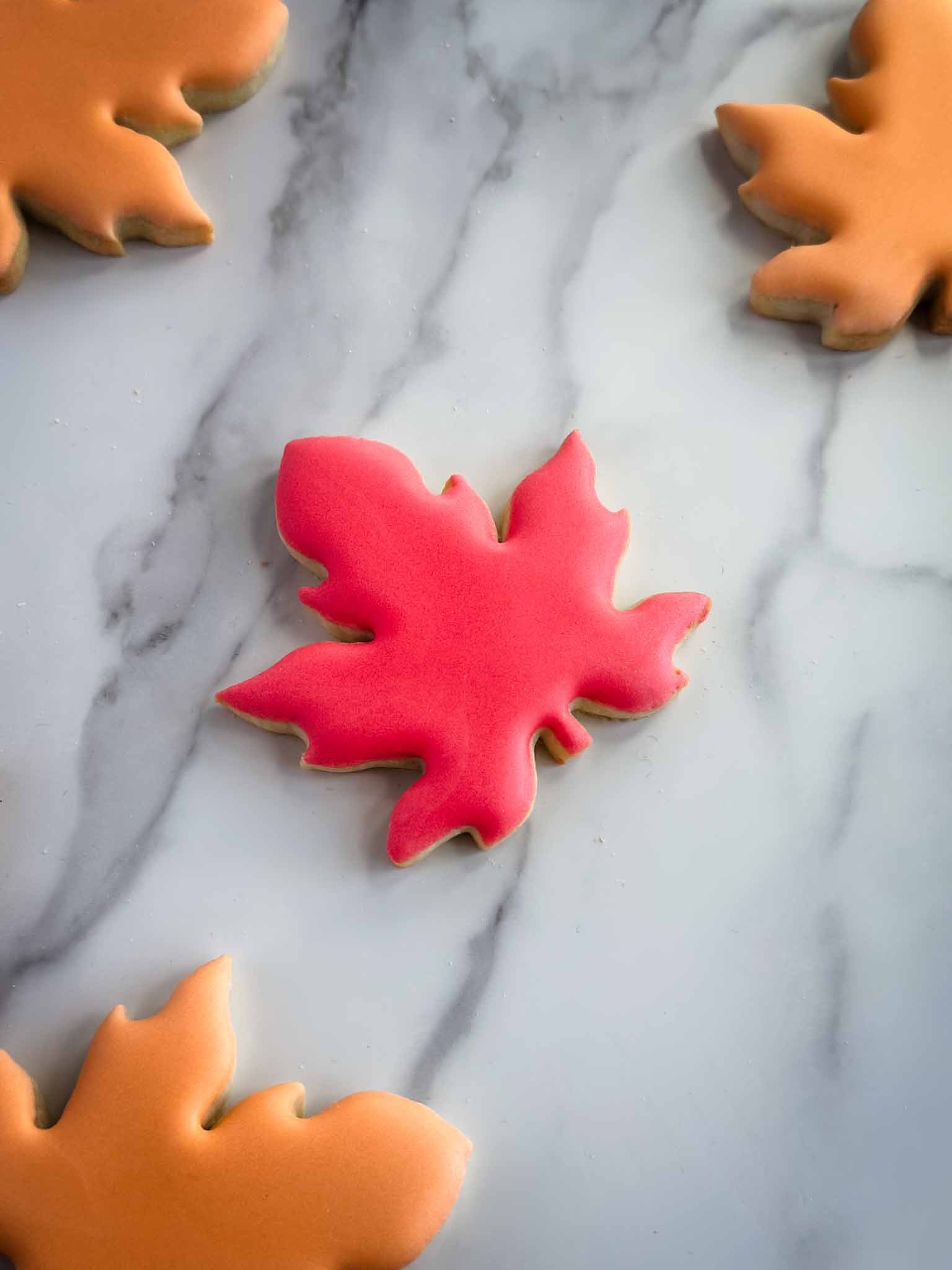A Worthy Cookie just dipped fall leaves in red and orange.jpg