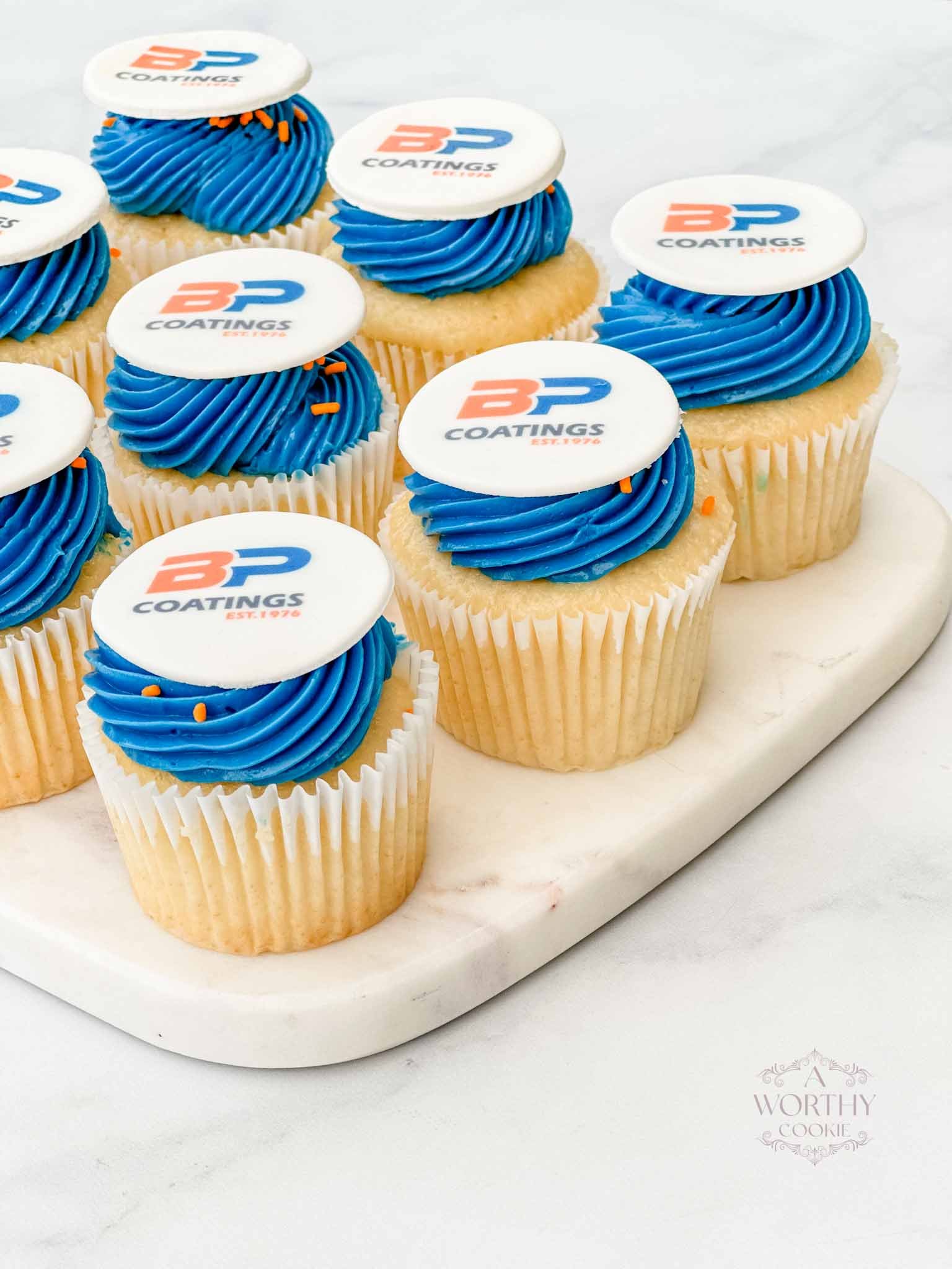 A Worthy Cookie Inc  blue frosting cupcakes.jpg