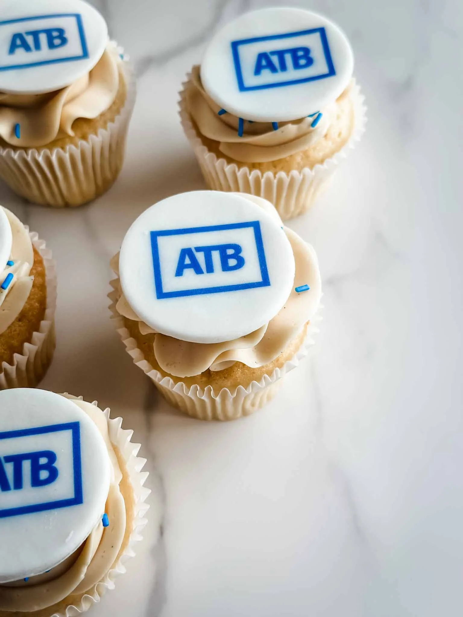 A Worthy Cookie Custom cupcakes with atb logo.jpg