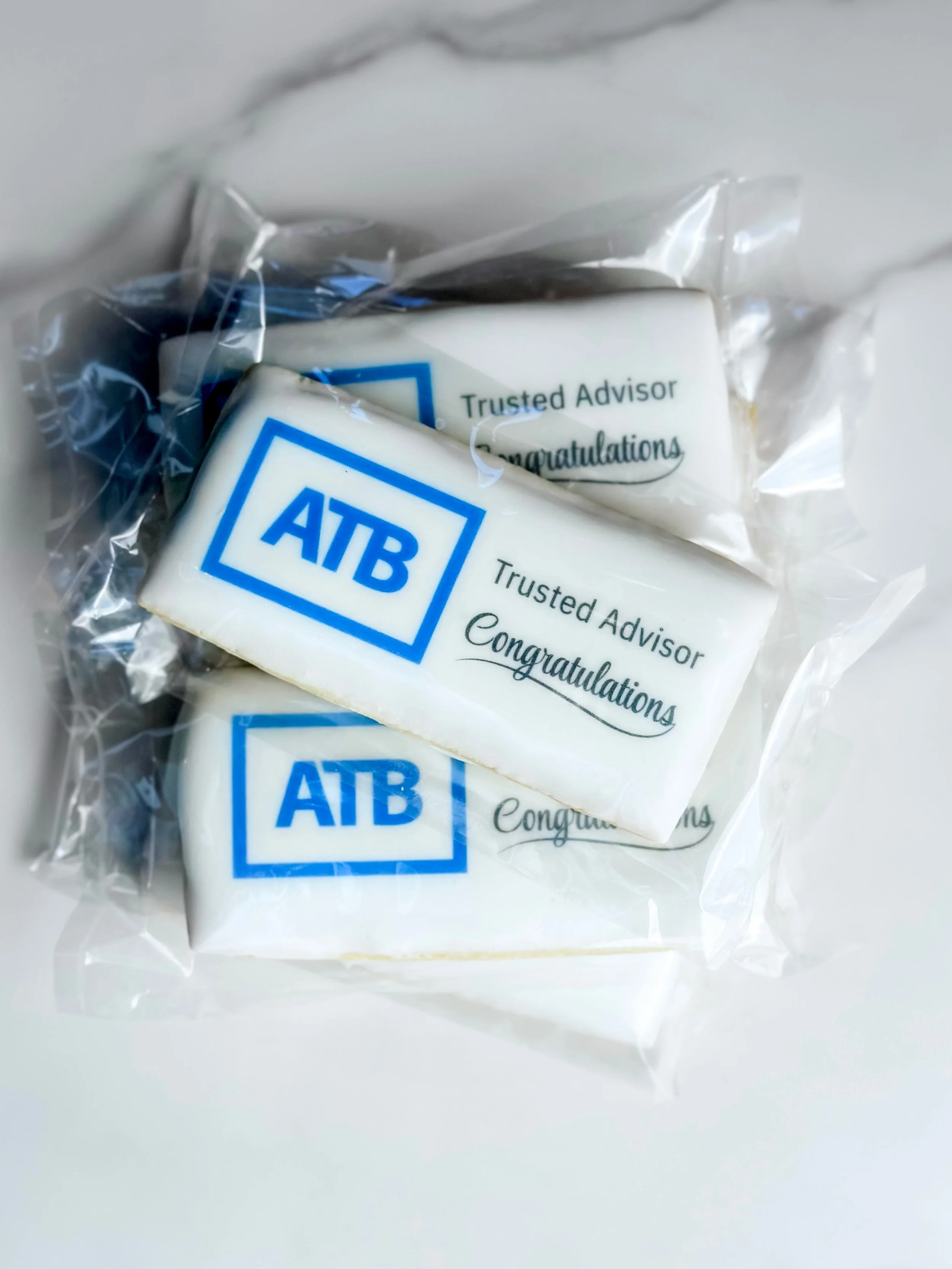 Celebrating achievements with something sweet. 💙

Custom branded sugar cookies for @atbfinancial created for employee recognition.

#EmployeeRecognition #BrandedCookies #CorporateGifting #EdmontonBusiness
