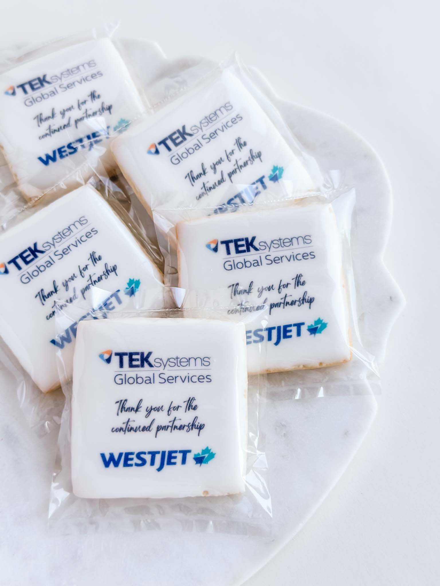 A Worthy Cookie Branded sugar cookies with two corporate logos and custom message medium square cookies.jpg
