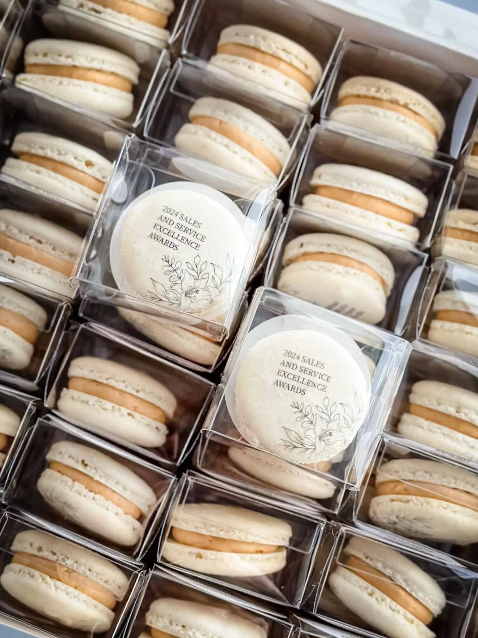 A Worthy Cookie staff award branded macarons individually boxed.jpg