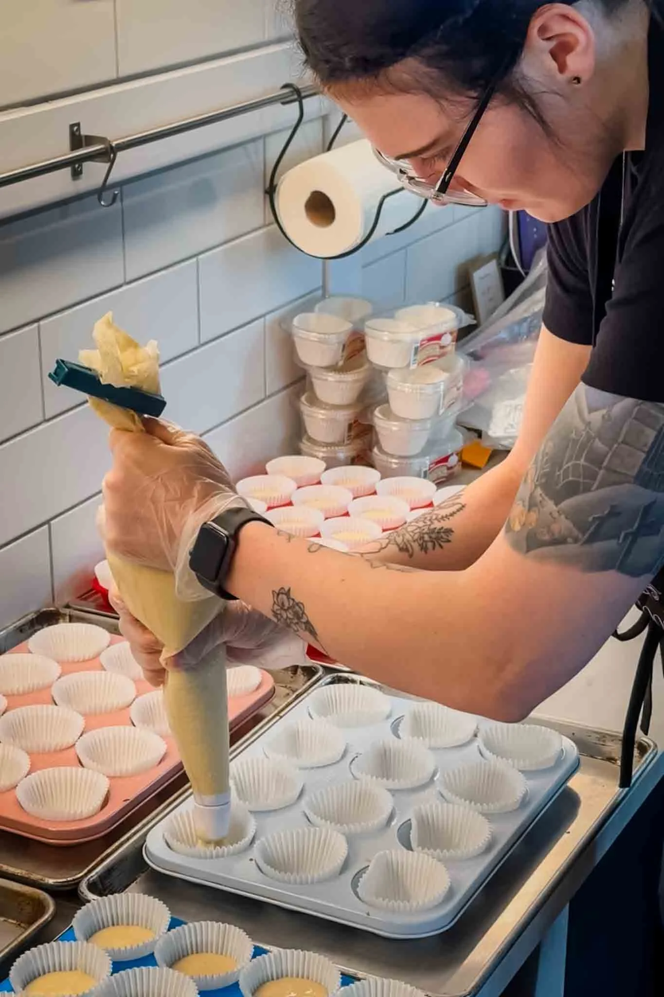 A Worthy Cookie Jay filling in cupcakes.jpg