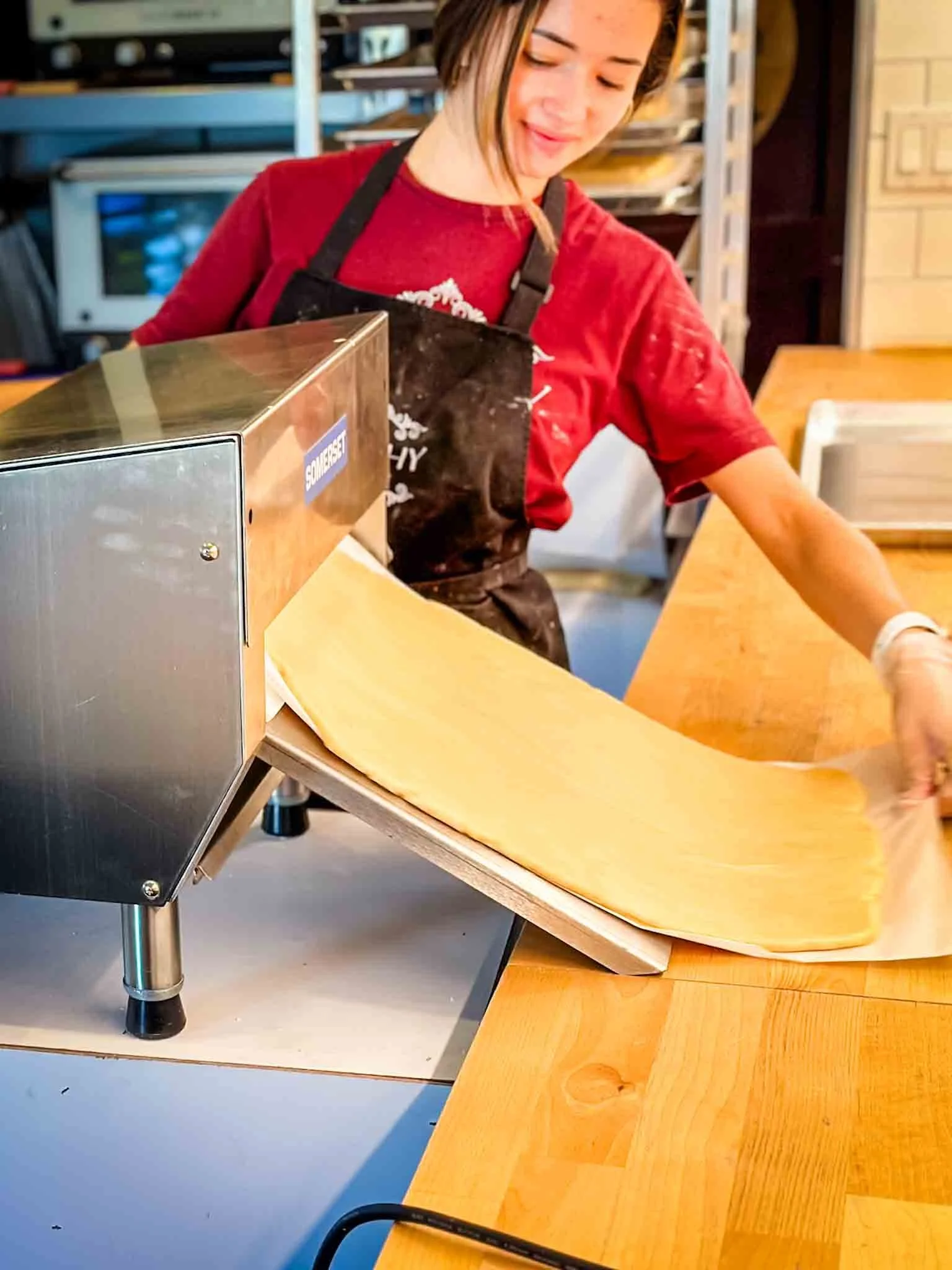 A Worthy Cookie Izabel rolling cookie dough.jpg