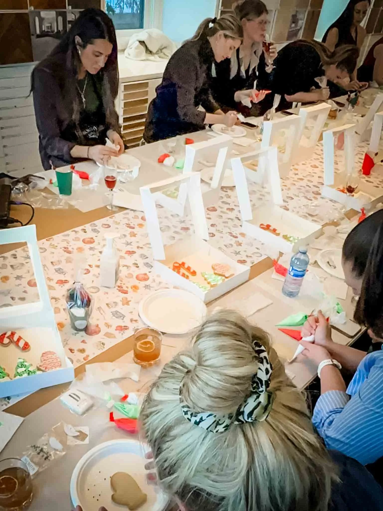 A Worthy Cookie Sugar Cookie decorting class people decorating.jpg