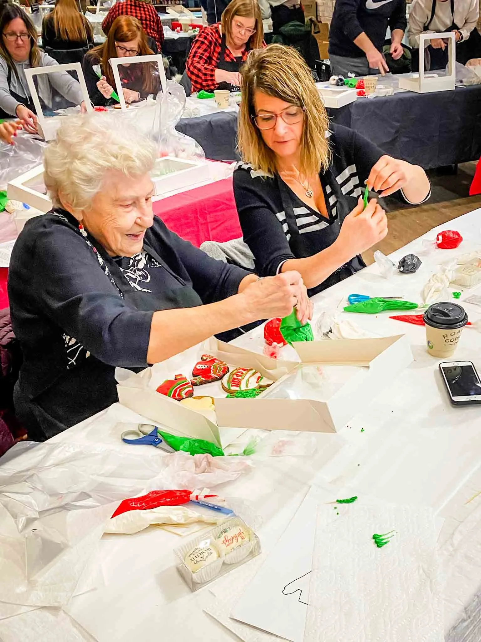 A Worthy Cookie Sugar Cookie decorting class two older ladies decorating.jpg