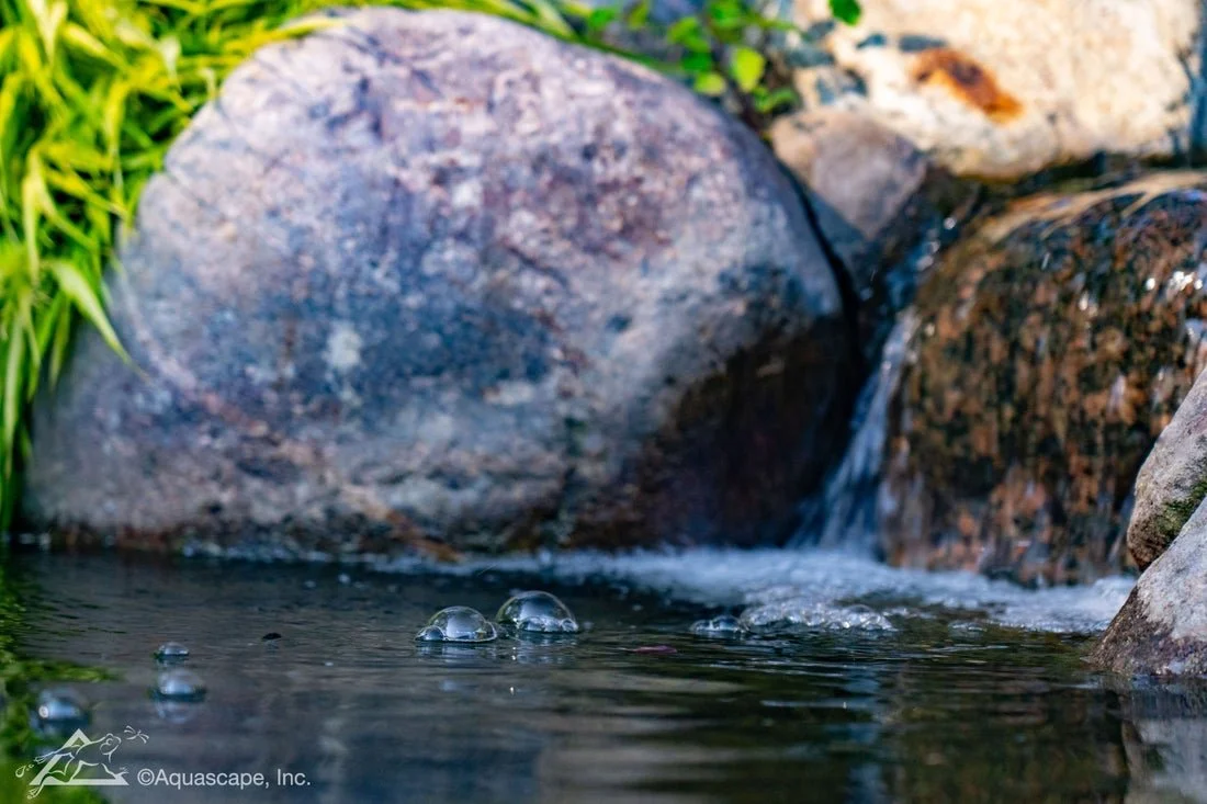 Some yards are beautiful, but still feel like they&rsquo;re missing something.

A large natural rock waterfall can become the piece that brings the whole space together.

It gives the yard a focal point.
It adds movement, sound, and life.
It creates 