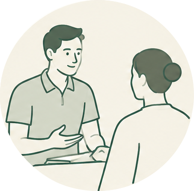 Osteopath discussing a patient's symptoms during an initial assessment