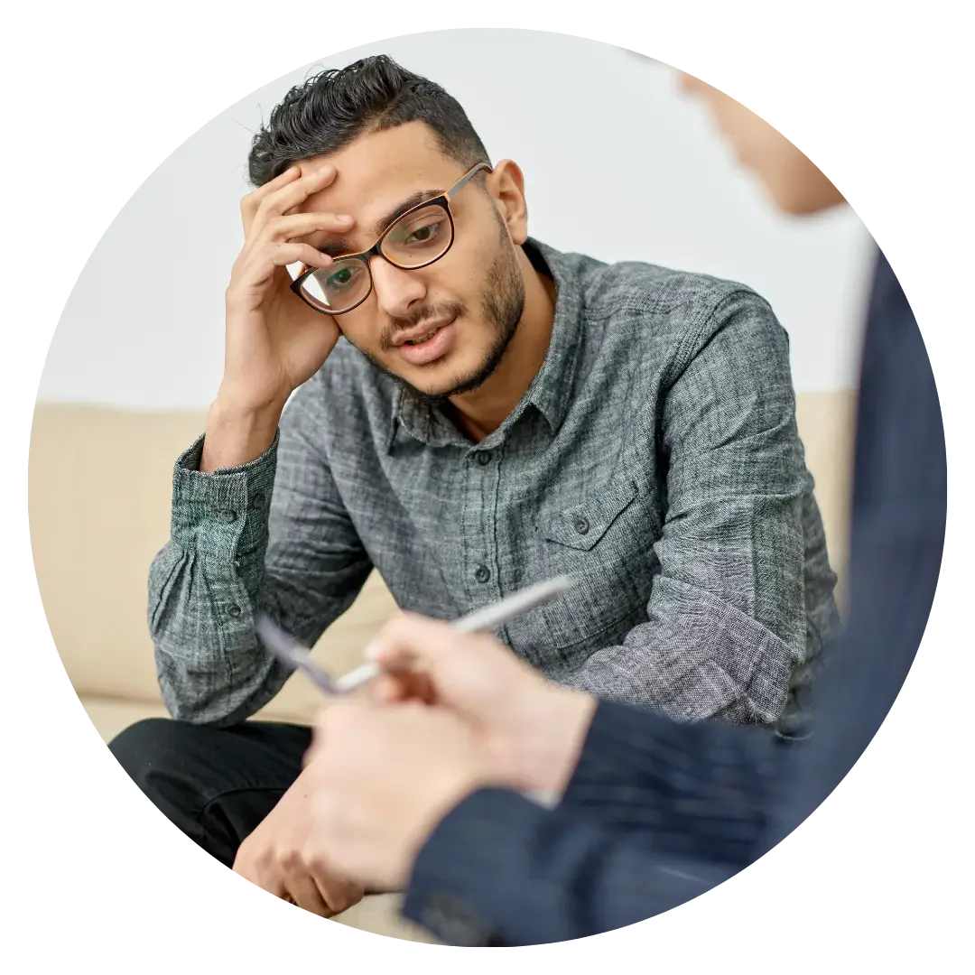 Man listening to psychologist during his sex and porn addiction therapy session