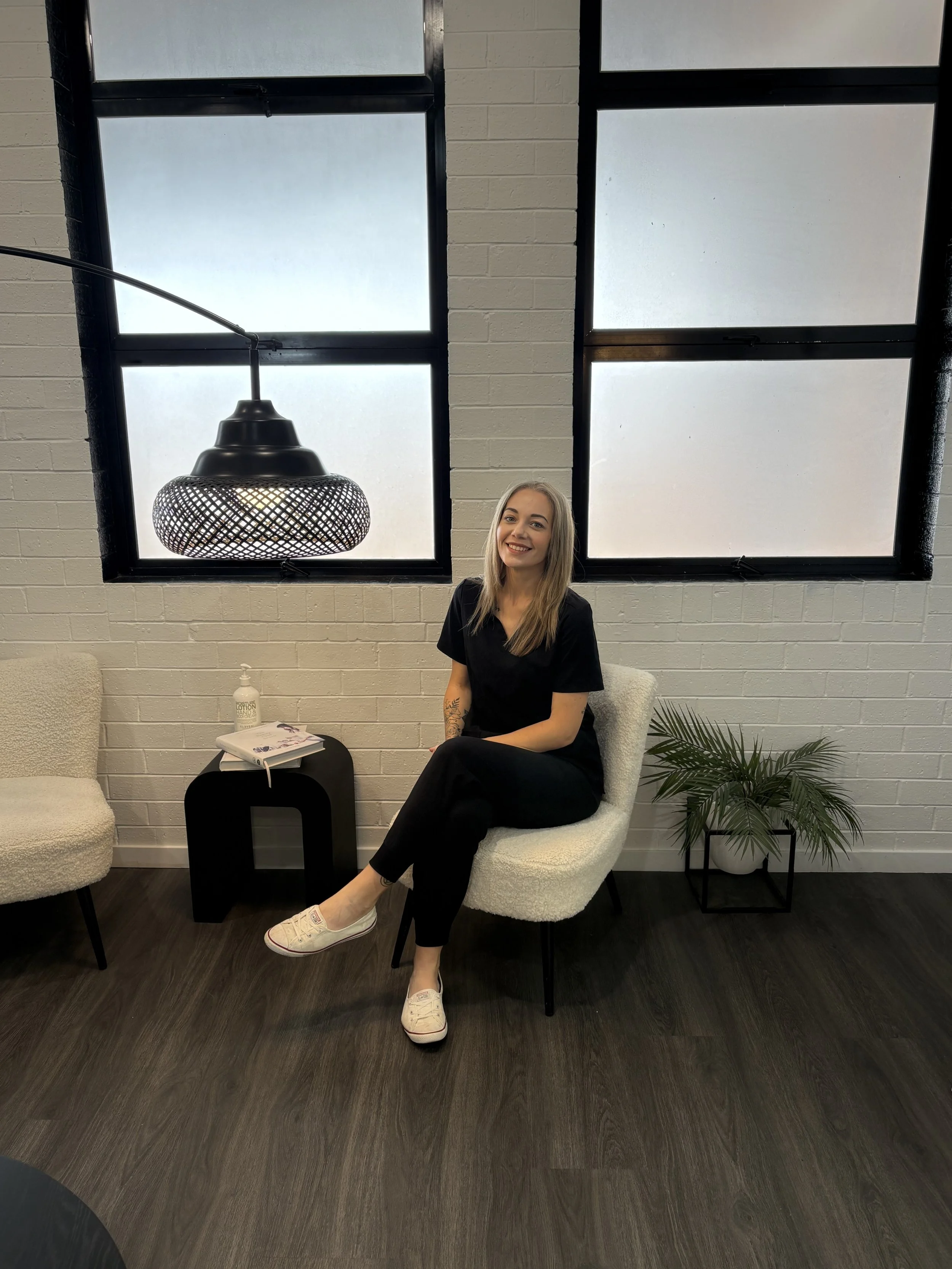 Text on beige background reading "BBE Brows Eyes Lips" with smaller text "PMU by Monique" beneath.