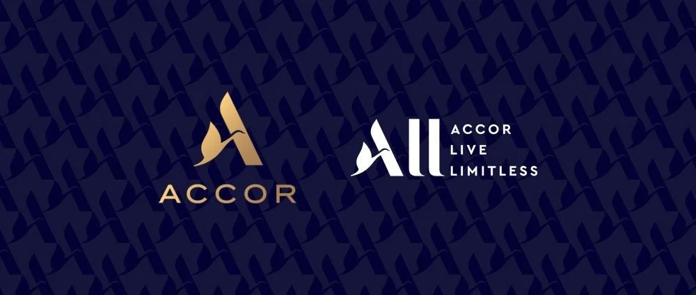 Logos of Accor and Accor Live Limitless in gold and white on a dark blue patterned background.