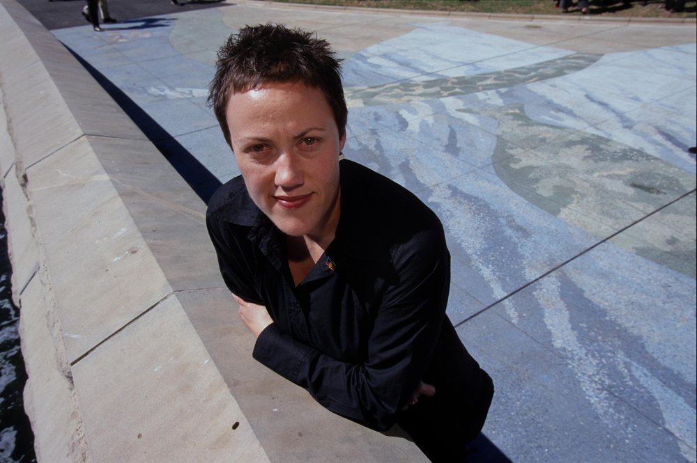Brenda L Croft with her artwork Wuganmagulya, at Farm Cove, Sydney, 2000