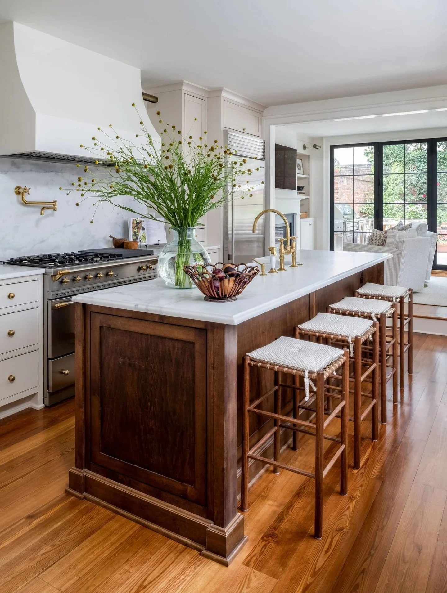 This 1800's townhome in Old Town, Alexandria, Virginia was originally designed in a railroad-style layout where rooms were arranged in a straight line, front to back. By opening up the back of the house and allowing the rooms to feel more connected, 