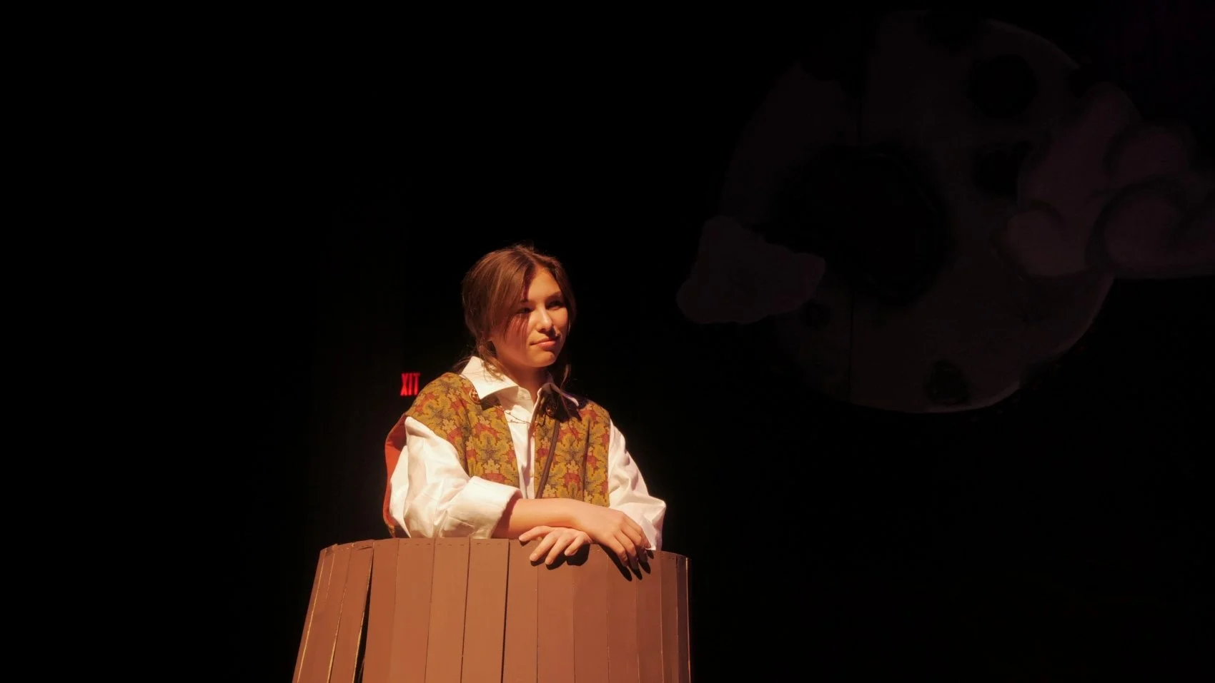 Avery Barstand standing in a bucket in Jax Schuck's production of Rosencrantz and Guildenstern Are Dead.